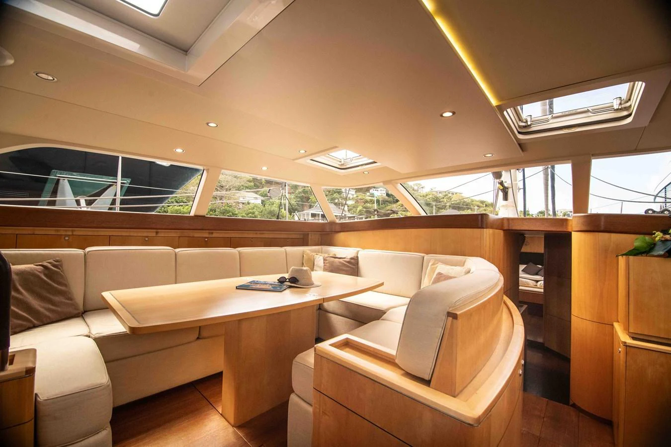 The yacht's salon features a spacious and elegant seating area with ample natural light. aboard BLACK PEARL II Yacht for Sale