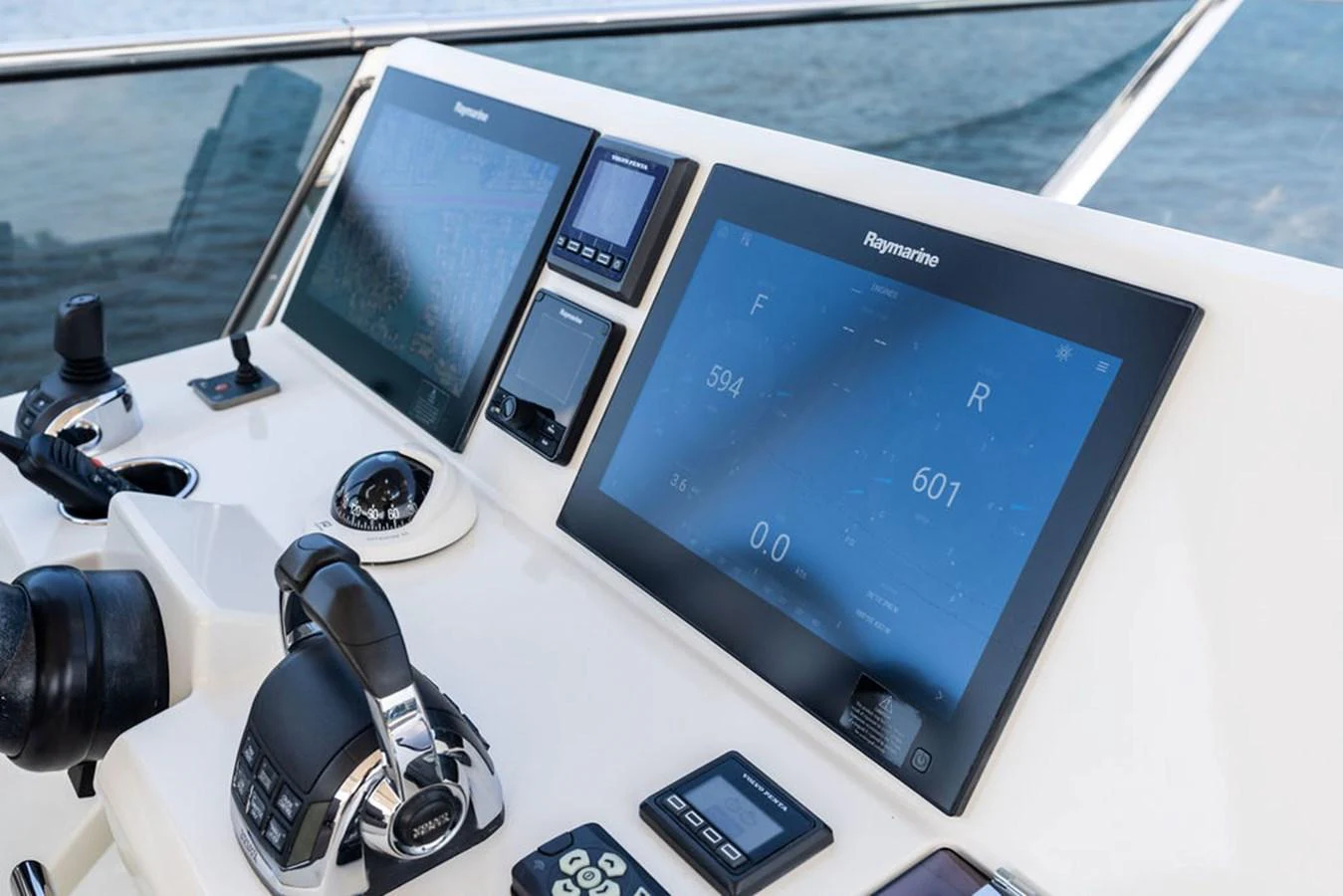The helm station features advanced navigation and control systems for a seamless sailing experience. aboard JOVE Yacht for Sale