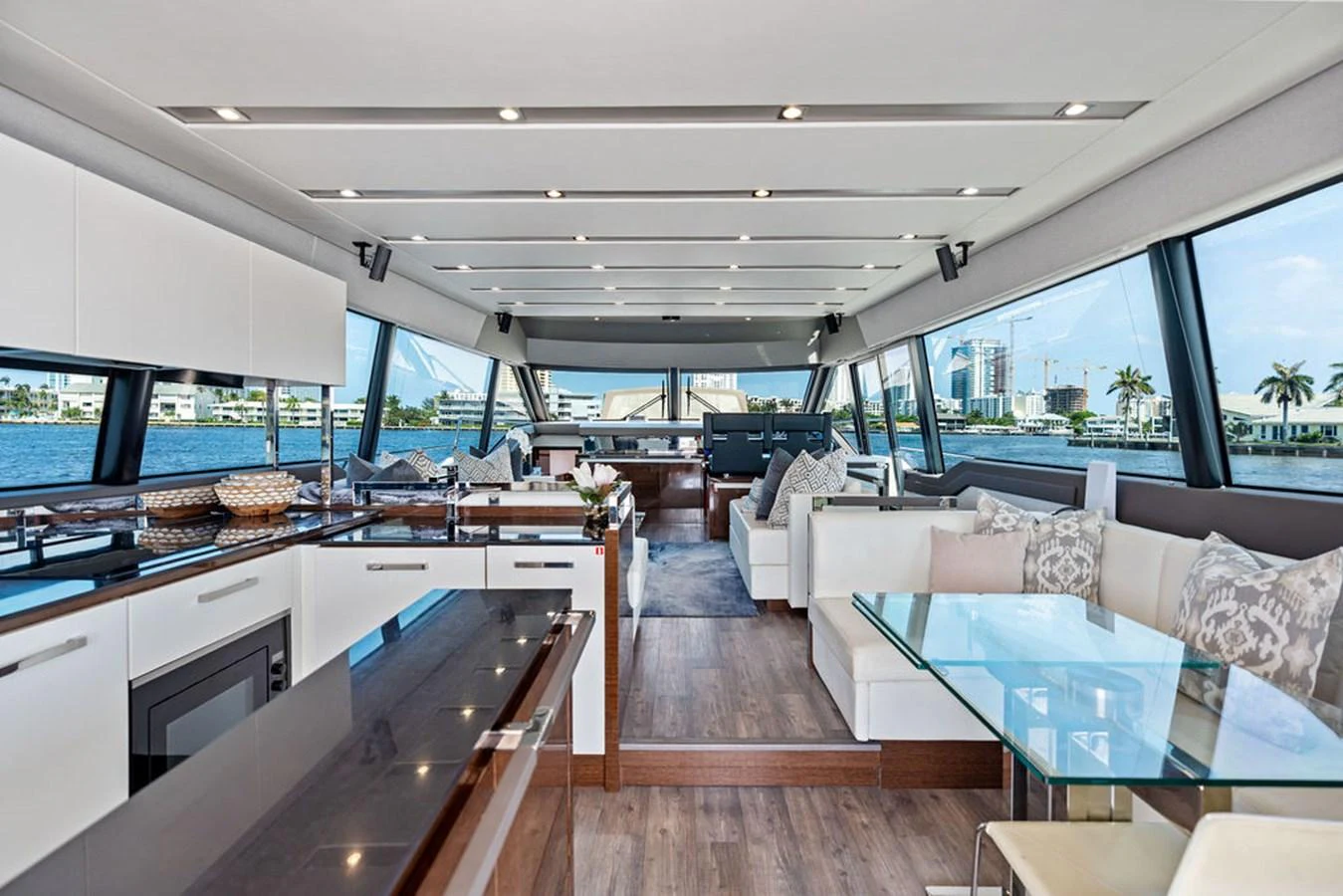 The spacious salon offers panoramic views and luxurious seating arrangements. aboard JOVE Yacht for Sale