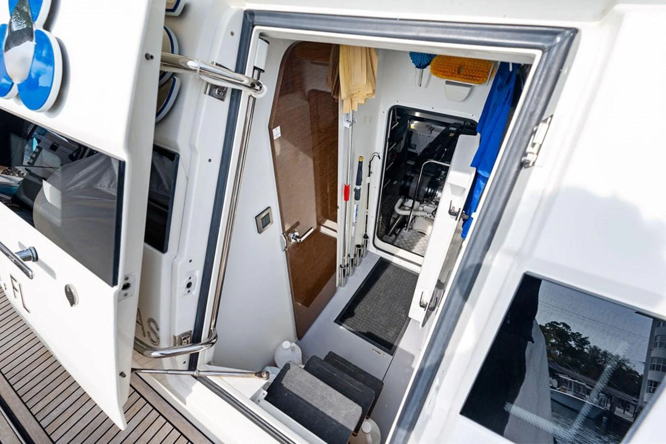 A close-up view of the yacht's entryway, showcasing the stairs and door leading to the interior. aboard JOVE Yacht for Sale