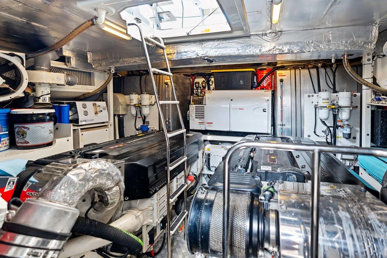 The engine room is meticulously organized, showcasing advanced machinery and equipment. aboard JOVE Yacht for Sale