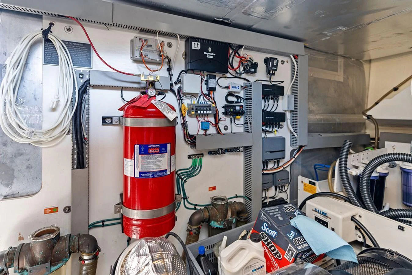 The image showcases the intricate details of the yacht's engine room, highlighting the technical equipment and safety features. aboard JOVE Yacht for Sale