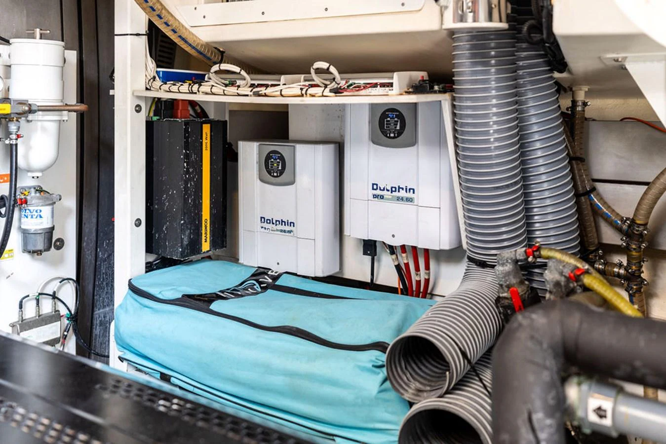 The image showcases the technical equipment and systems within the yacht's engine room. aboard JOVE Yacht for Sale