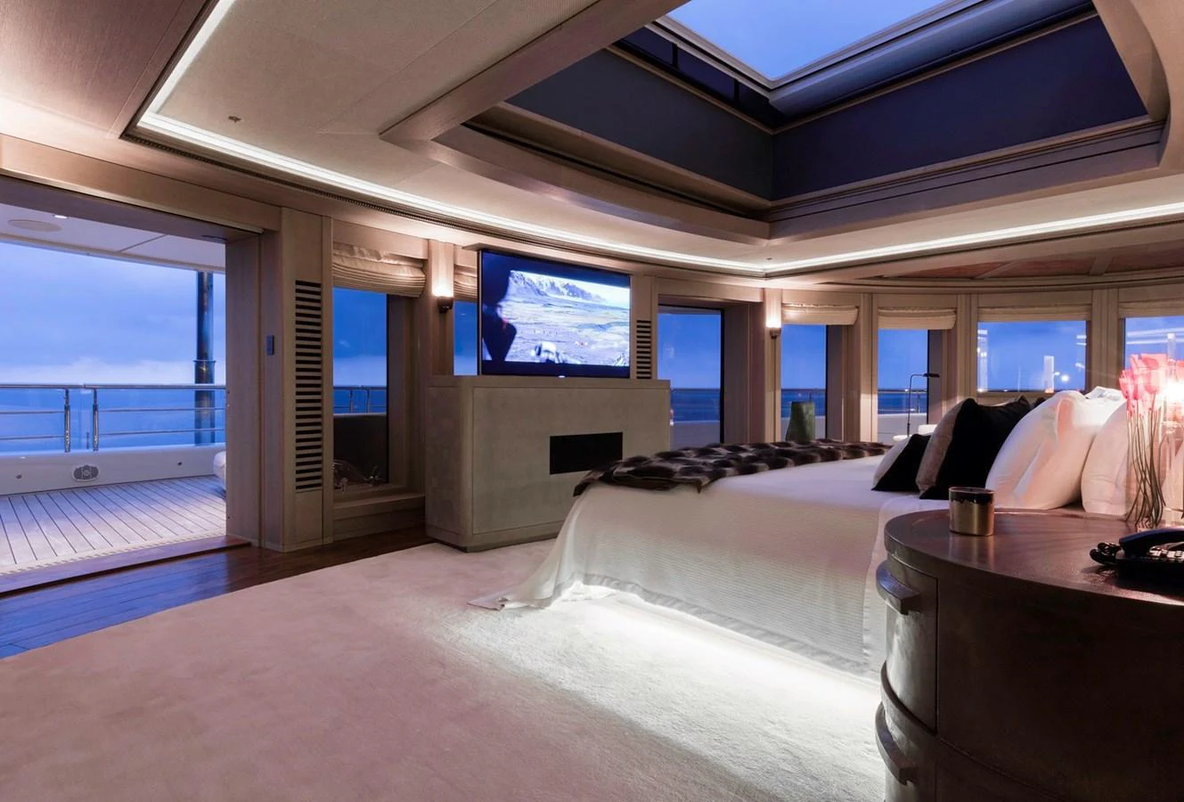 The master stateroom offers luxurious comfort with panoramic views and elegant furnishings. aboard LUNA Yacht for Sale