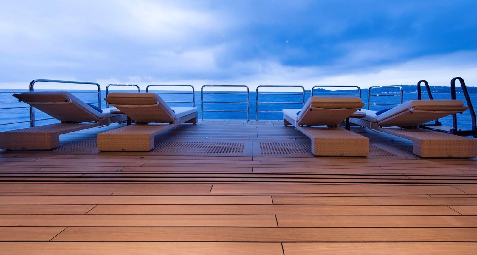 The sundeck features luxurious loungers with a stunning ocean view. aboard LUNA Yacht for Sale