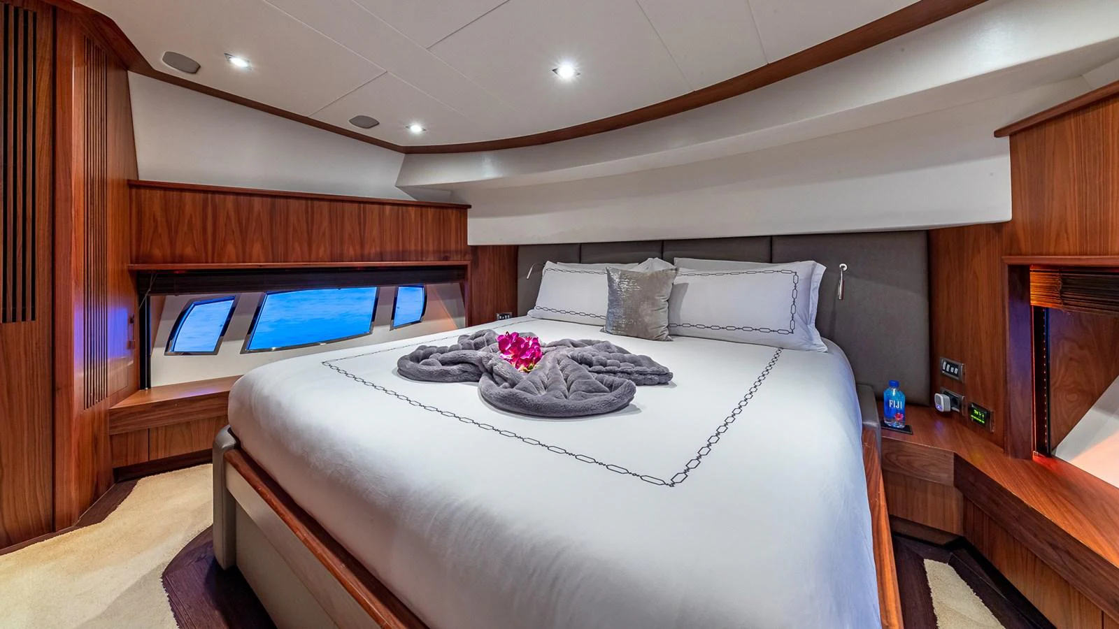 a bed in a room aboard EMRYS Yacht for Sale