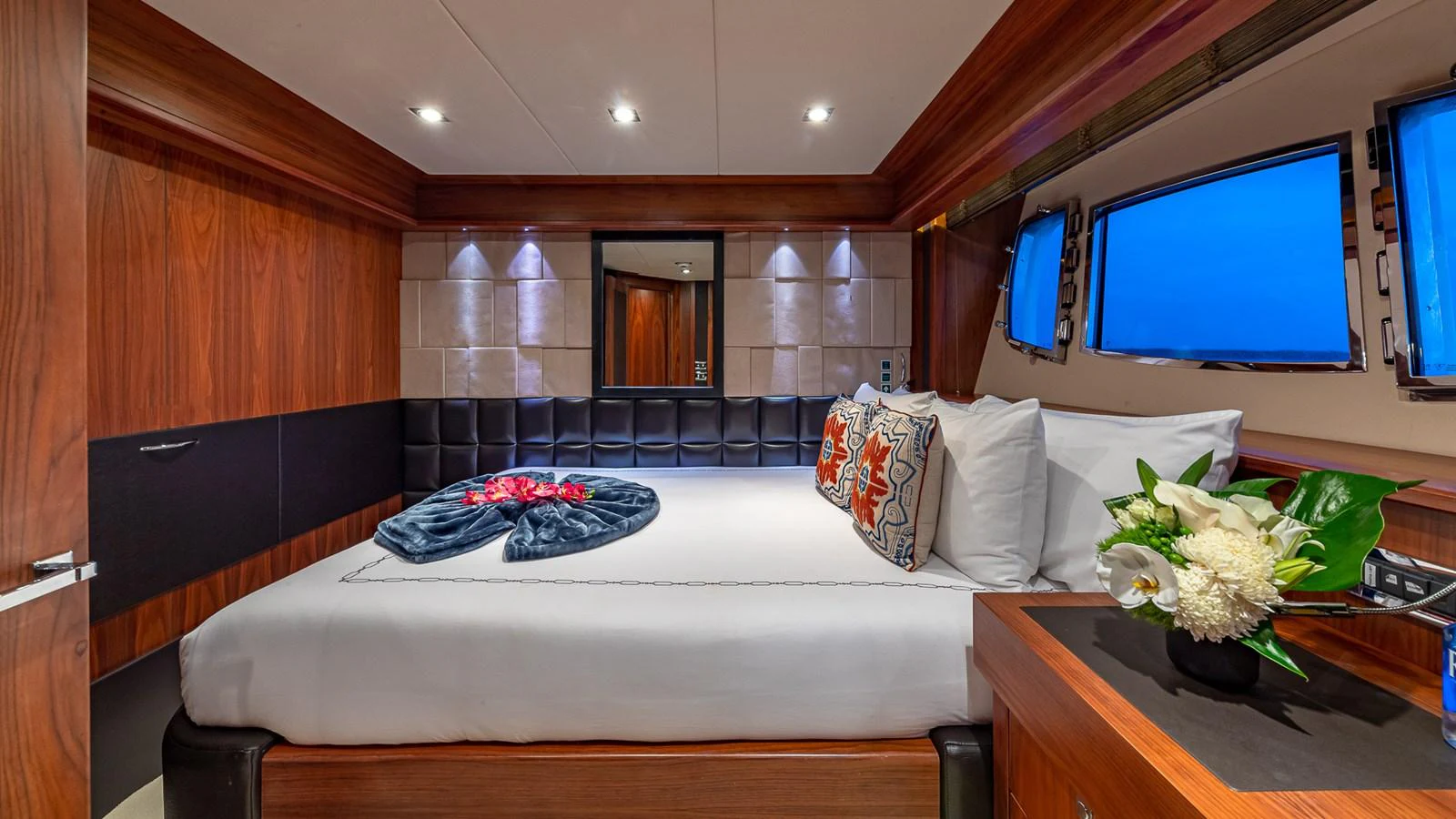 a room with a bed and a tv aboard EMRYS Yacht for Sale