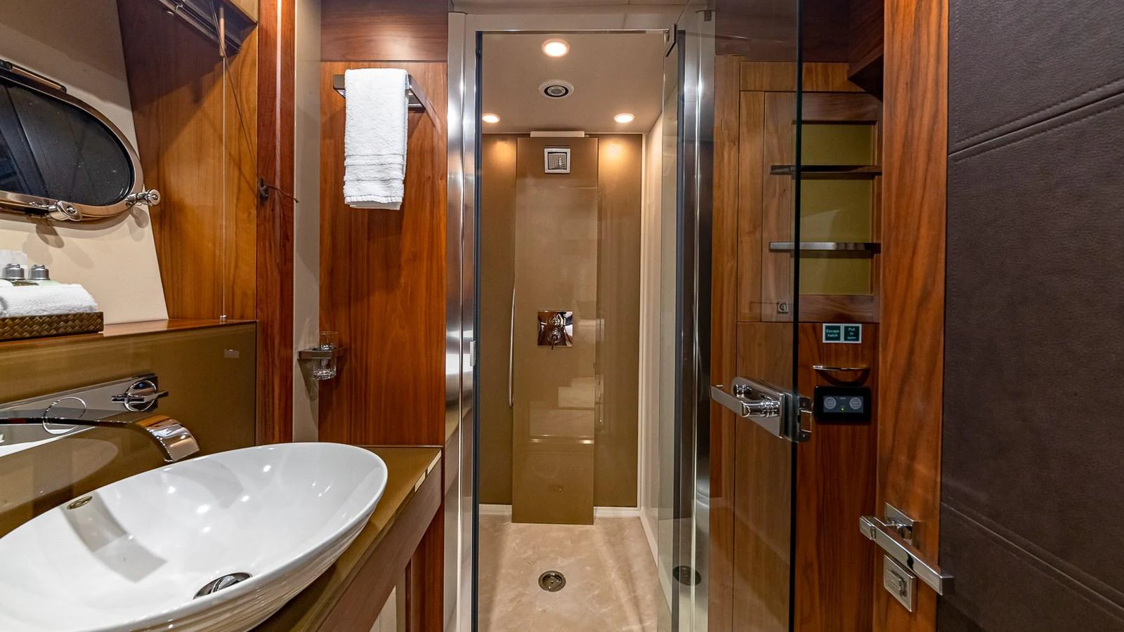a bathroom with a sink and a shower aboard EMRYS Yacht for Sale