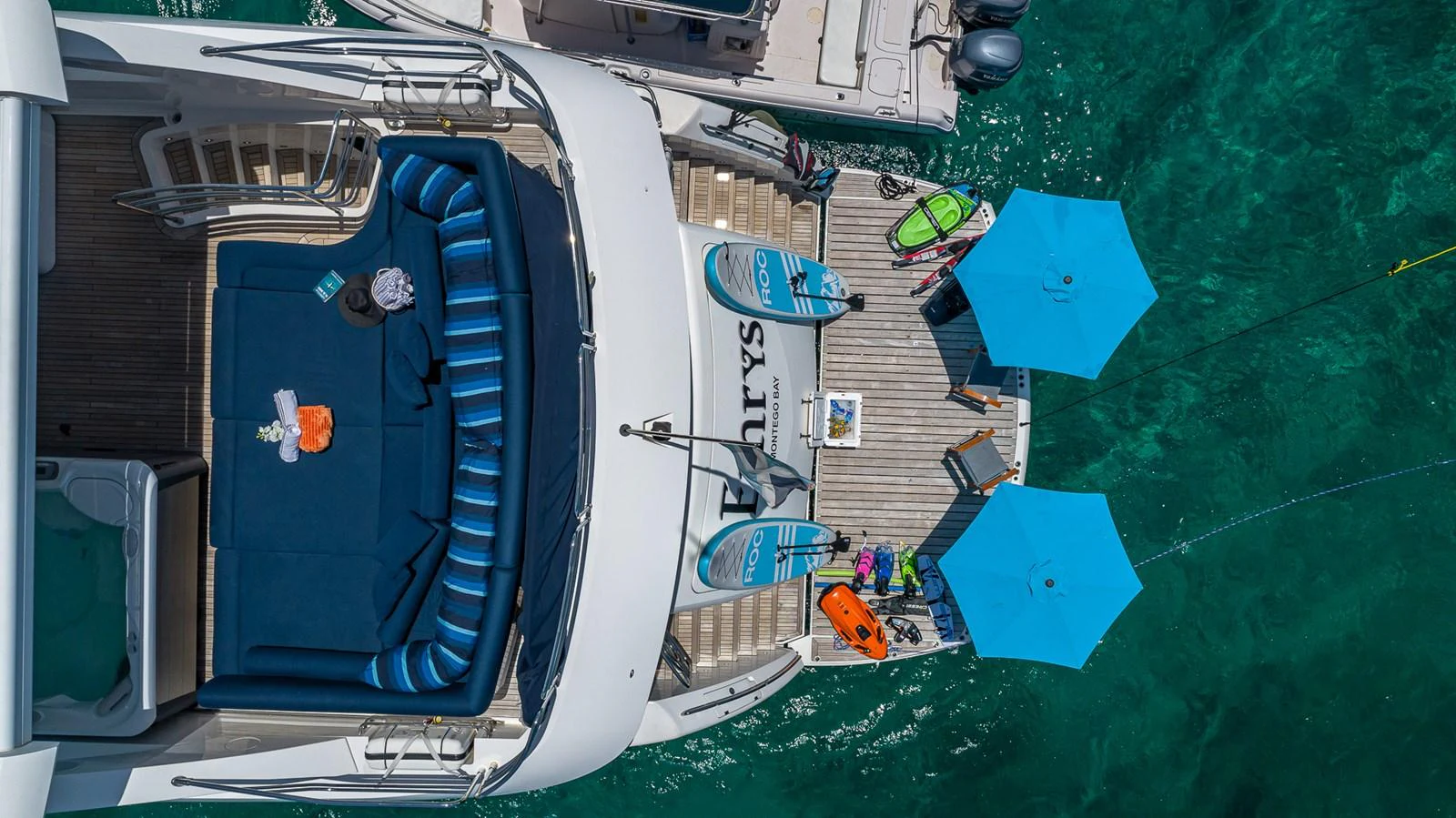 a boat with a blue cover aboard EMRYS Yacht for Sale