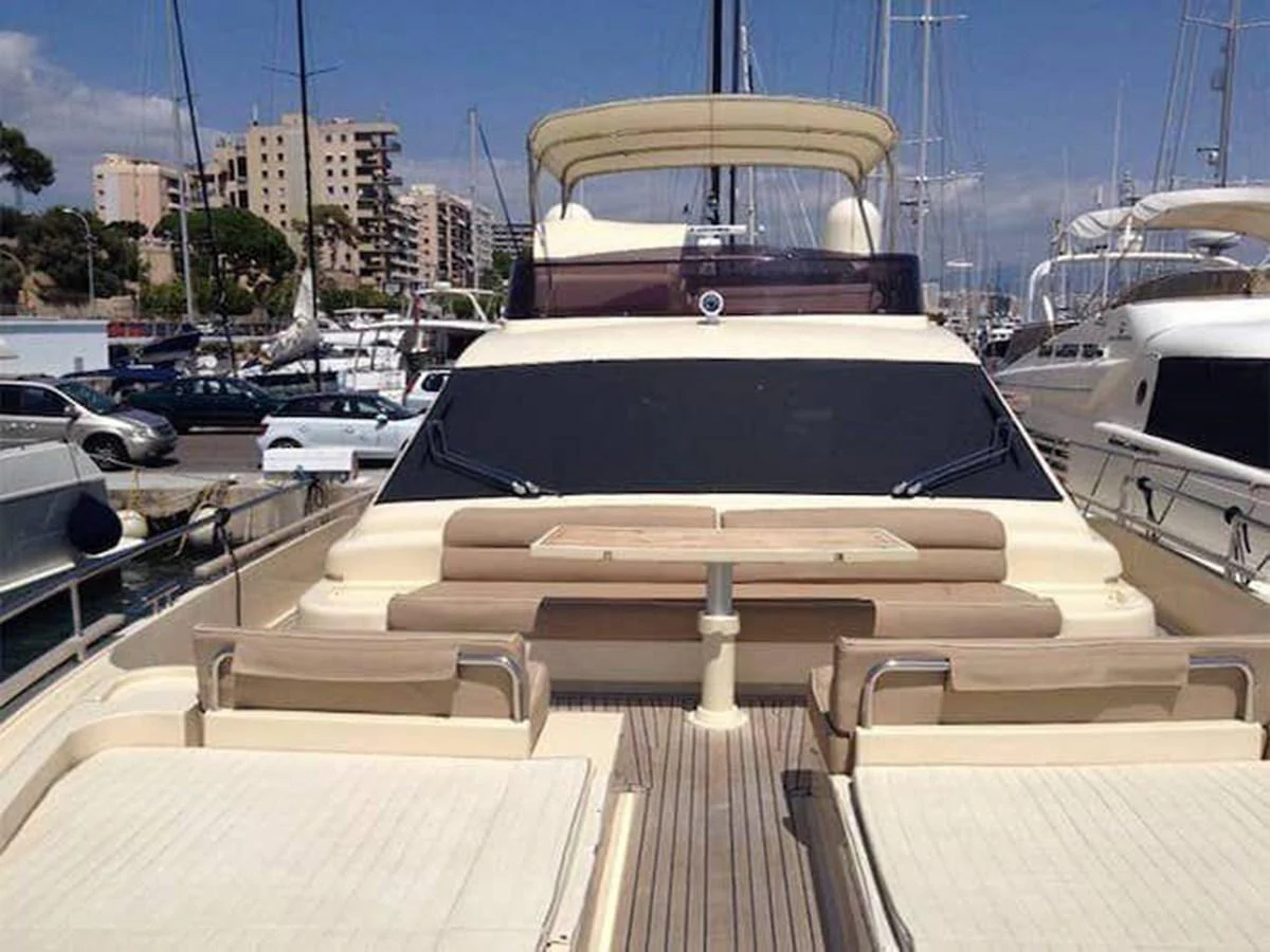 The yacht's flybridge offers a spacious and inviting area for relaxation and socializing. aboard CARAMEL Yacht for Sale