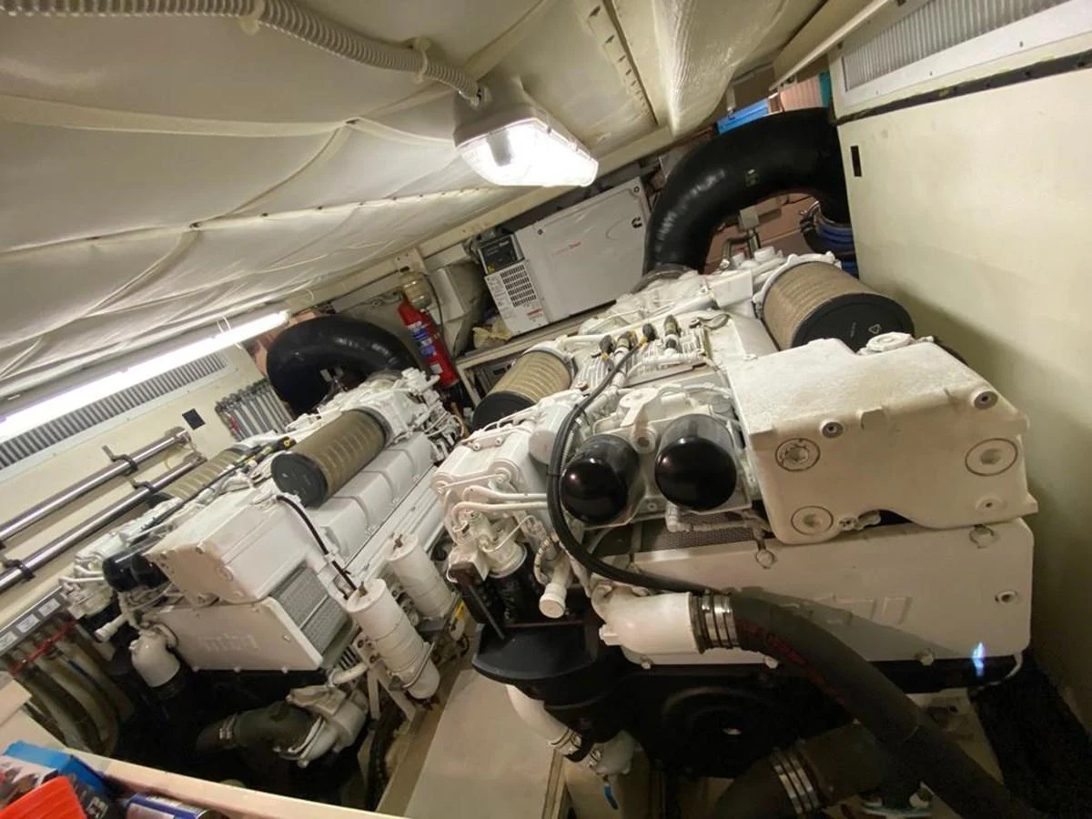 The image showcases the yacht's engine room with powerful machinery and well-organized components. aboard CARAMEL Yacht for Sale
