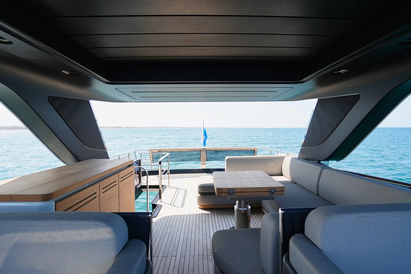 The aft deck offers a spacious and stylish area for relaxation with a stunning view of the sea. aboard AMY Yacht for Sale