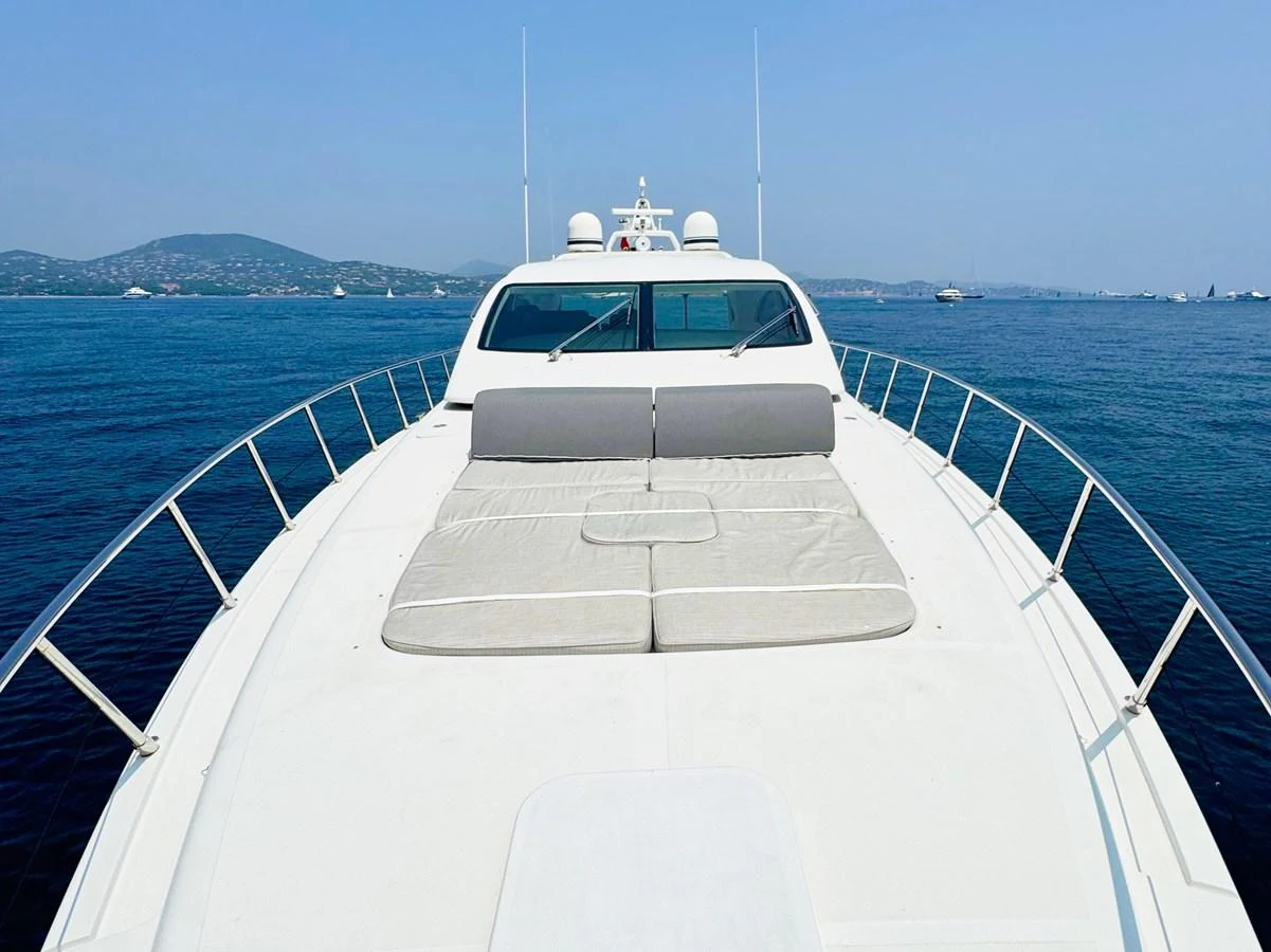 The yacht's foredeck features spacious sun pads for ultimate relaxation while cruising. aboard CARO Yacht for Sale