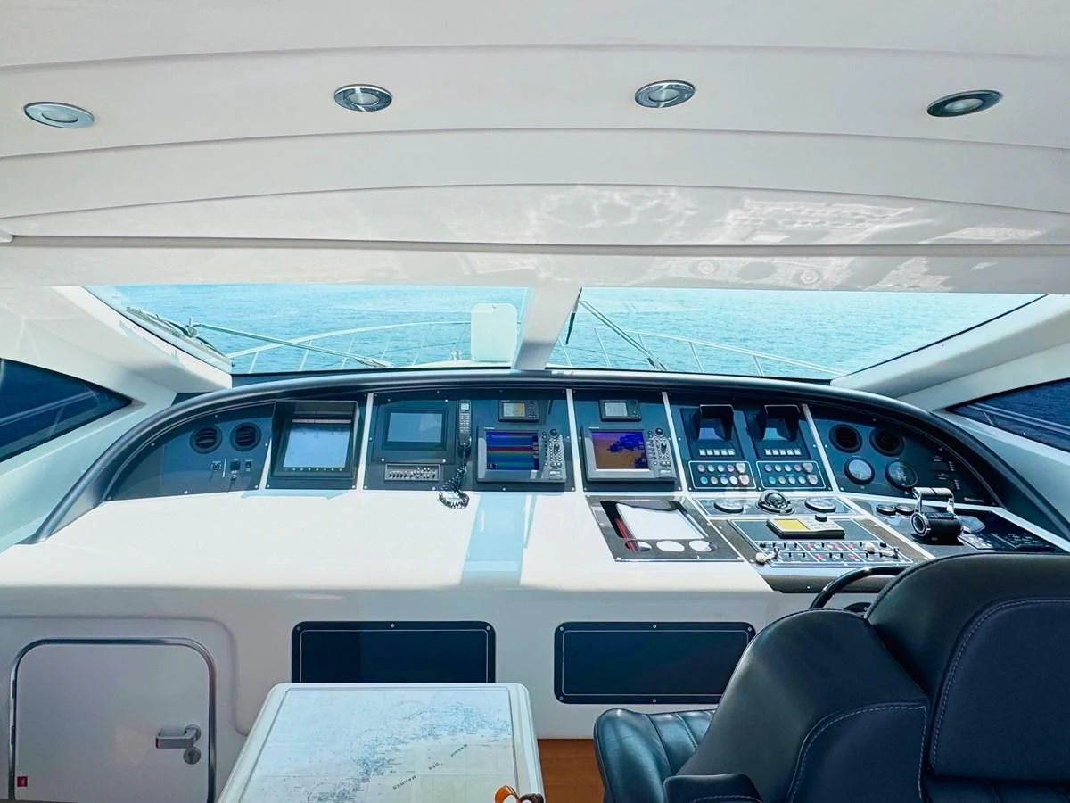 The helm station offers a panoramic view and state-of-the-art navigation equipment. aboard CARO Yacht for Sale