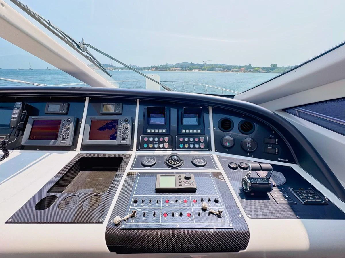 The helm station offers a sophisticated array of navigation and control instruments with a panoramic view of the sea. aboard CARO Yacht for Sale