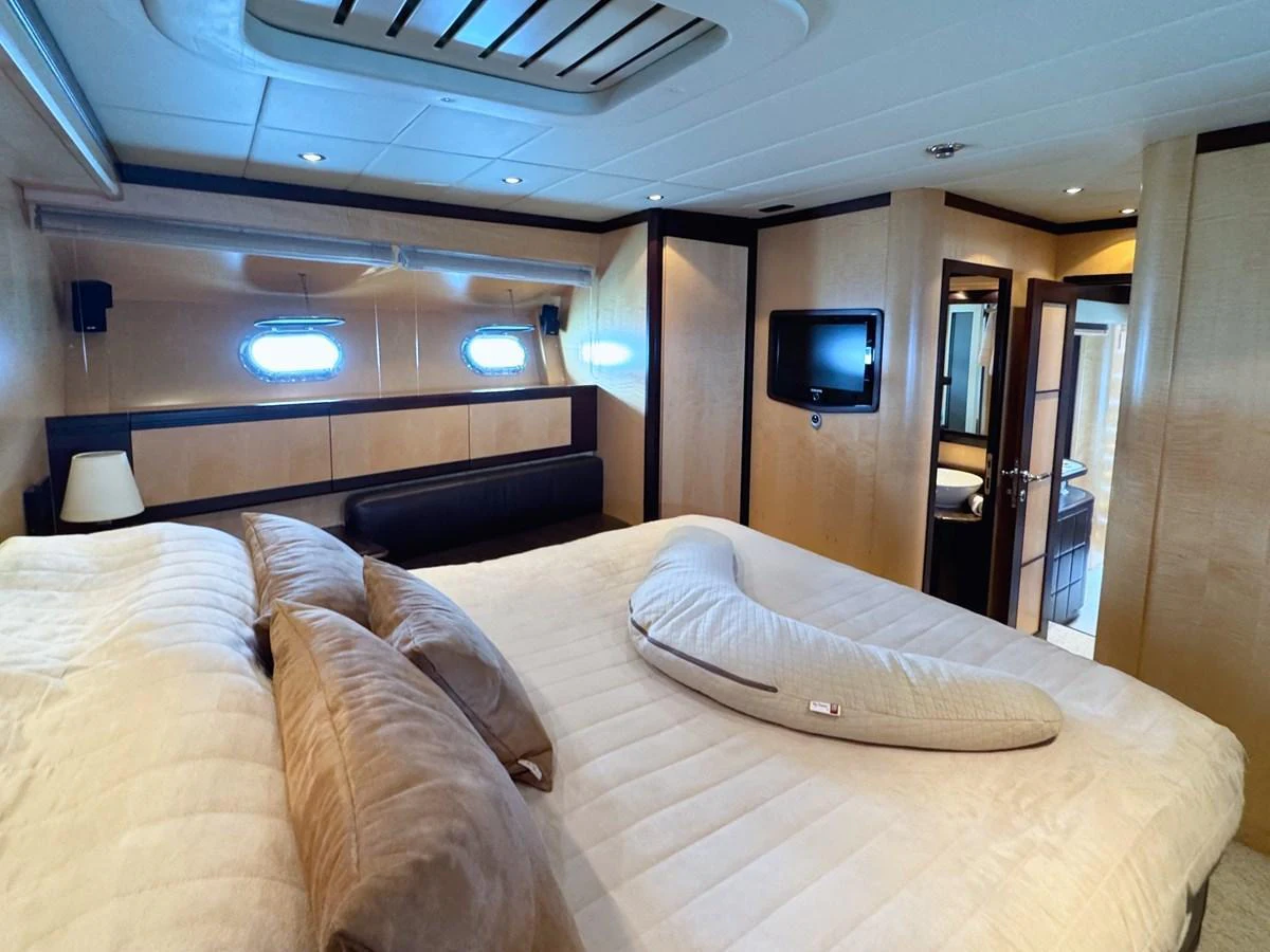 The master stateroom offers a luxurious and spacious retreat with elegant furnishings and modern amenities. aboard CARO Yacht for Sale