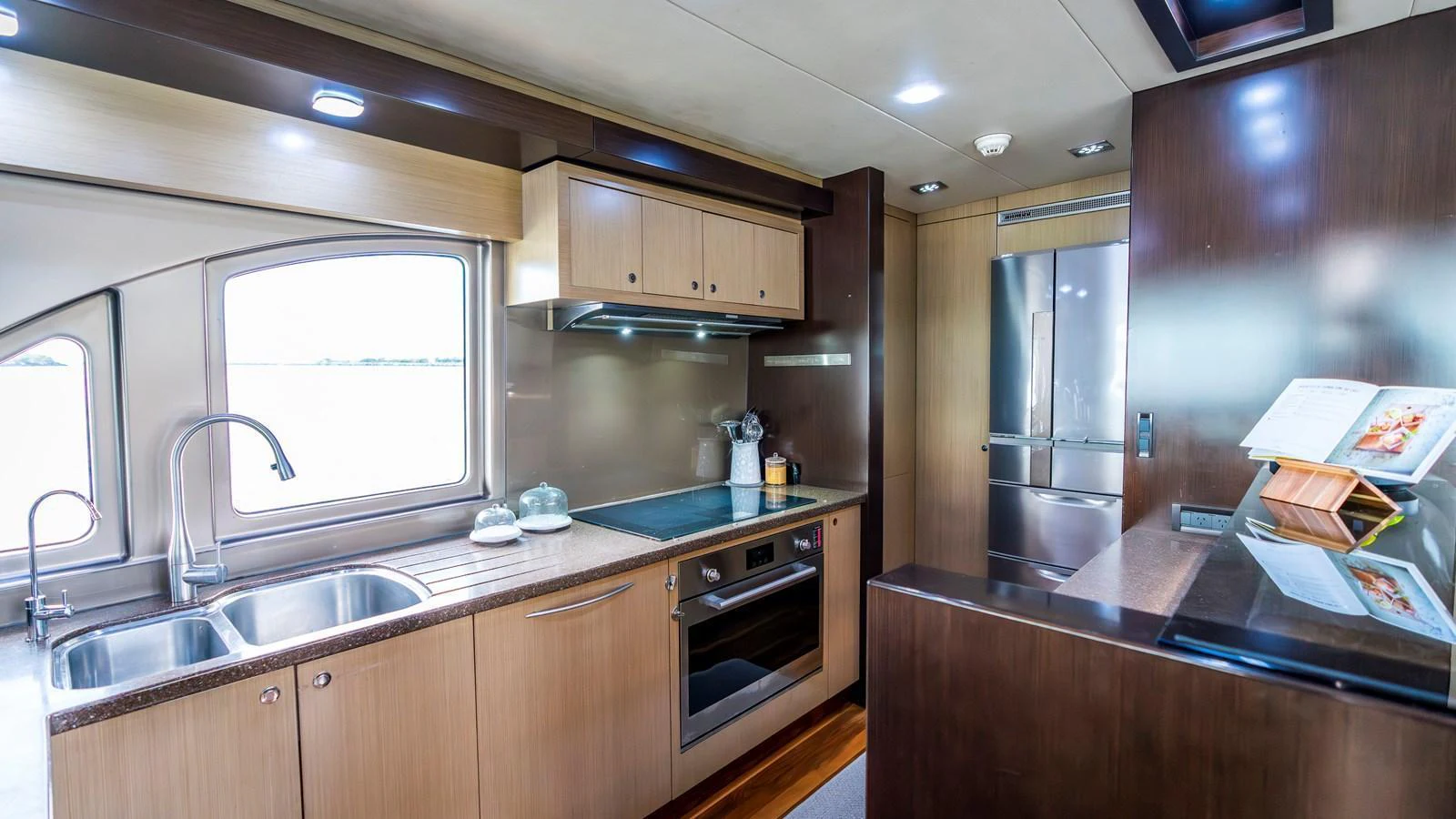 The yacht's galley is equipped with modern appliances and ample counter space, perfect for culinary endeavors at sea. aboard TEXAS T Yacht for Sale