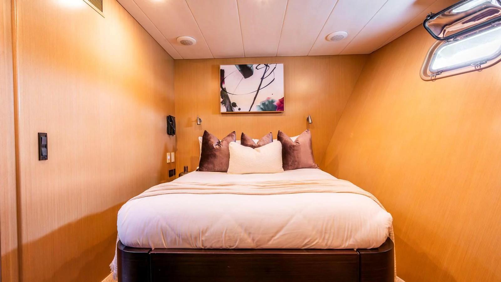 A cozy stateroom with a comfortable bed and modern decor. aboard TEXAS T Yacht for Sale