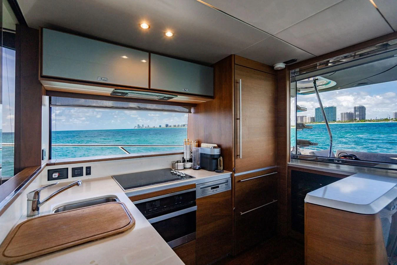 a kitchen with a large window aboard COCOON Yacht for Sale