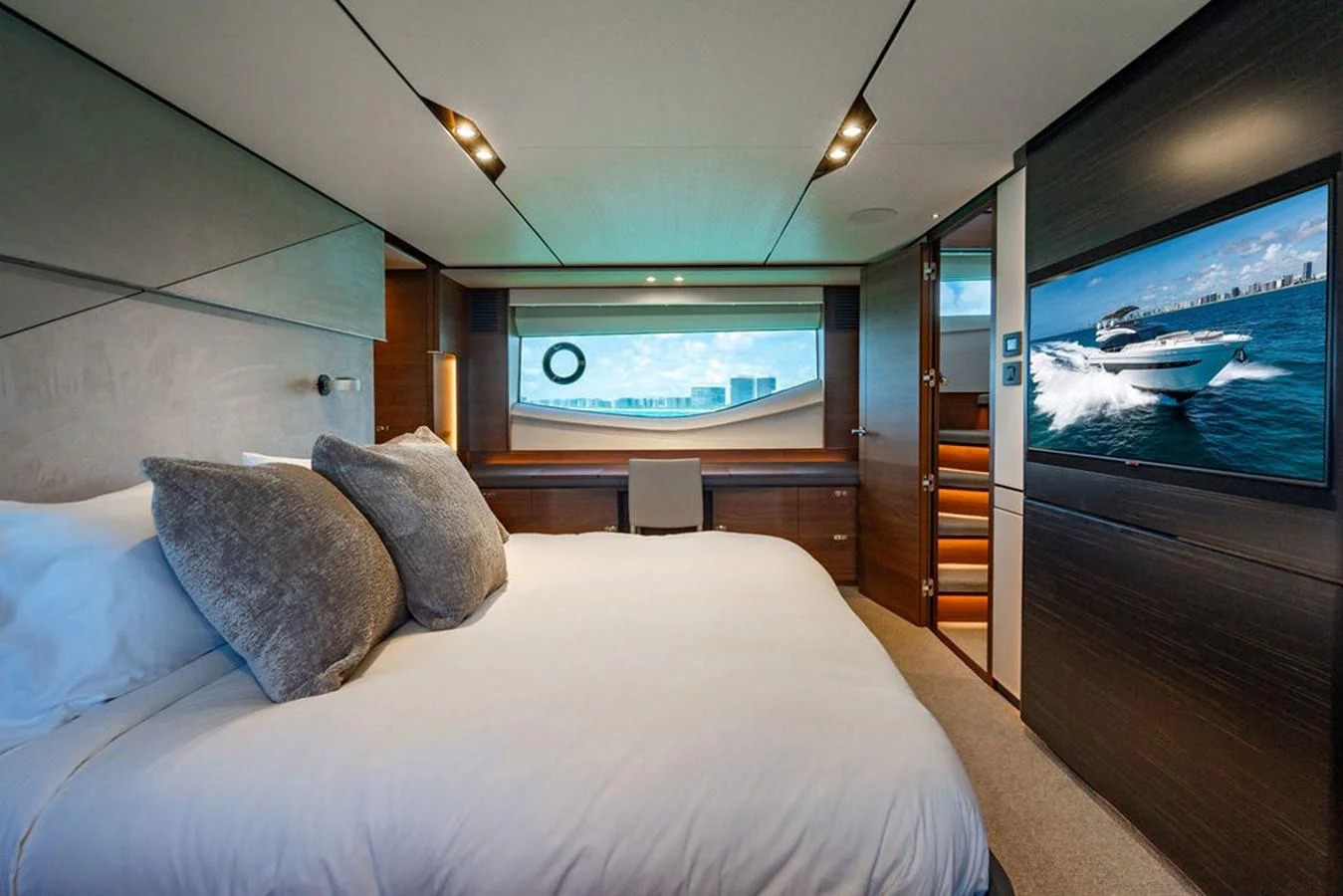 a bed in a room aboard COCOON Yacht for Sale