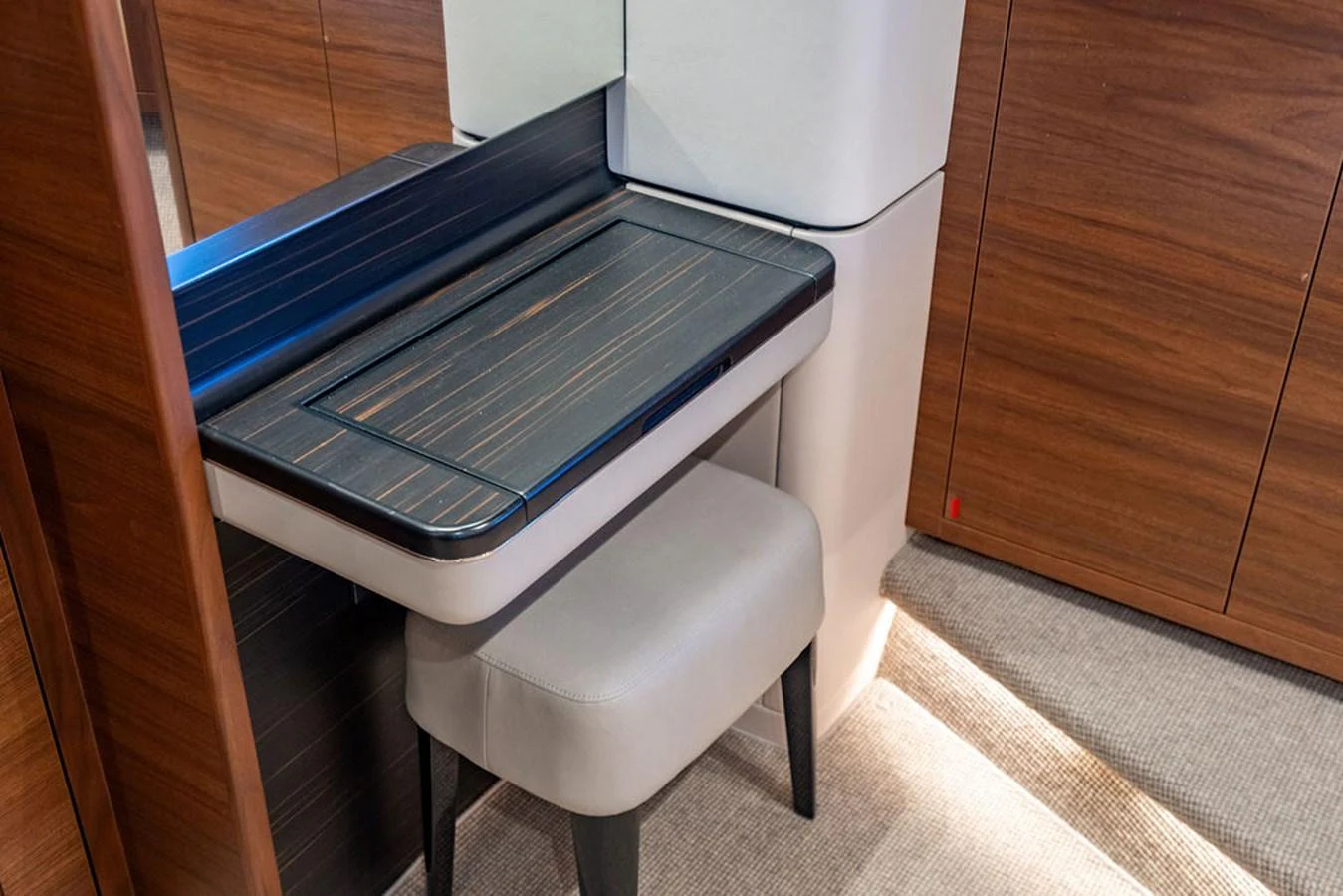 a chair next to a microwave aboard COCOON Yacht for Sale
