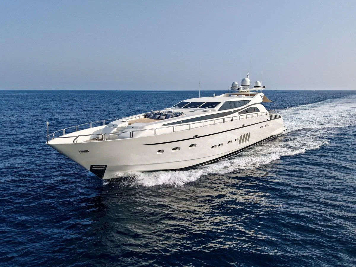 A sleek and modern yacht cruises swiftly through the open sea, showcasing its elegant design and luxurious amenities. aboard CHEEKY TIGER Yacht for Sale