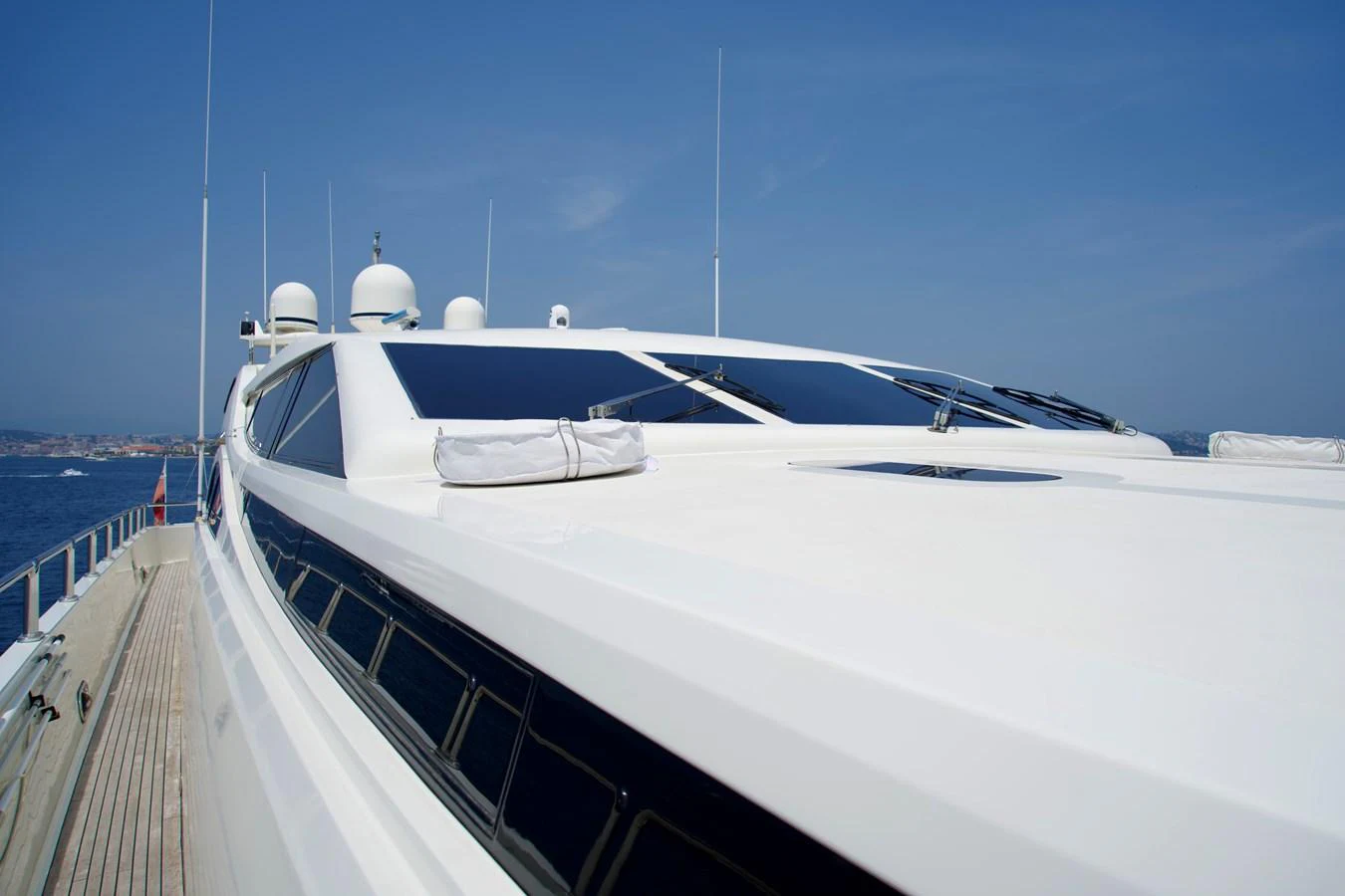The sleek exterior of the yacht showcases its modern design and expansive deck space. aboard CHEEKY TIGER Yacht for Sale