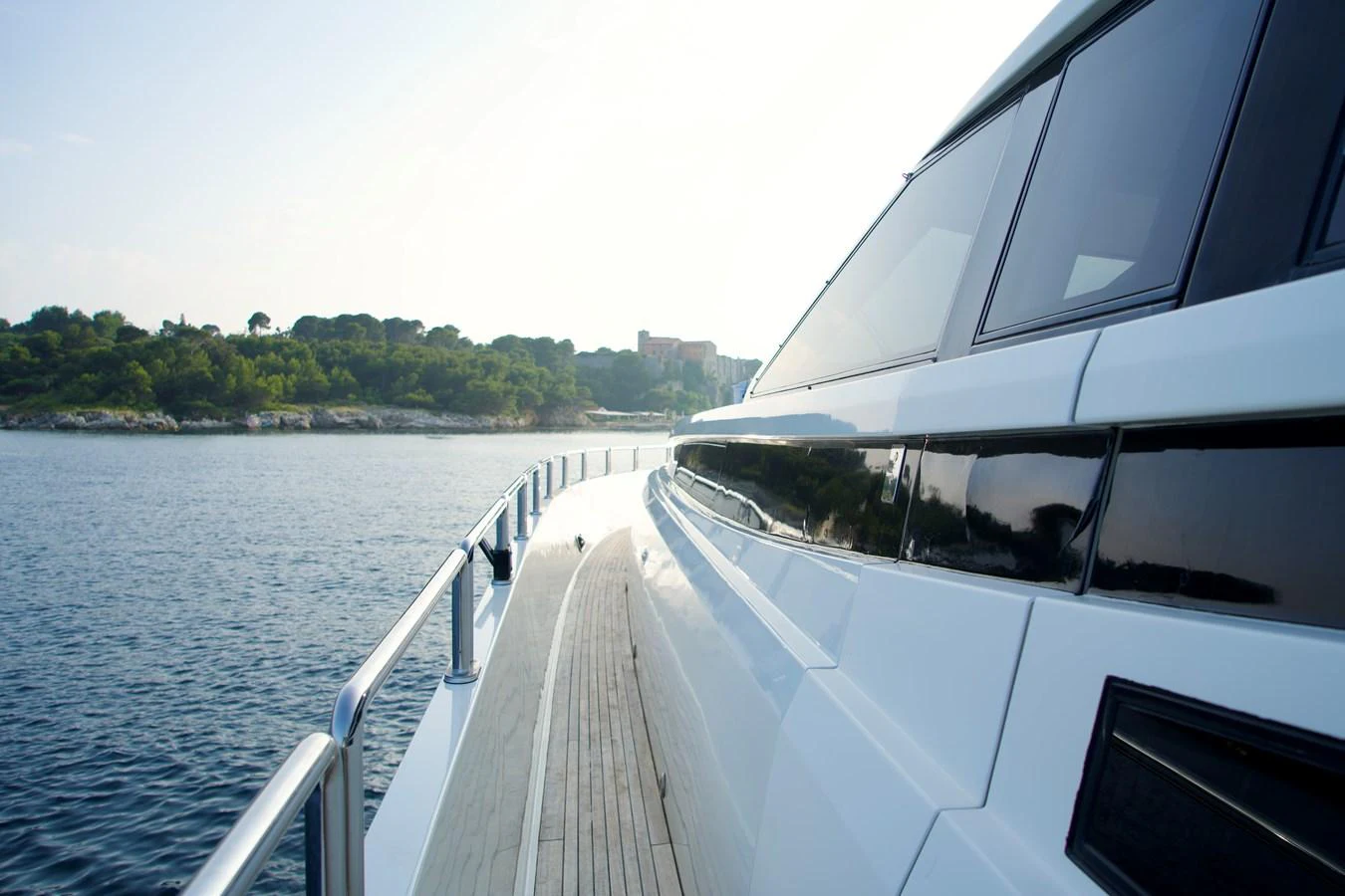 The sleek exterior of the yacht glides smoothly along the water, showcasing its modern design. aboard CHEEKY TIGER Yacht for Sale