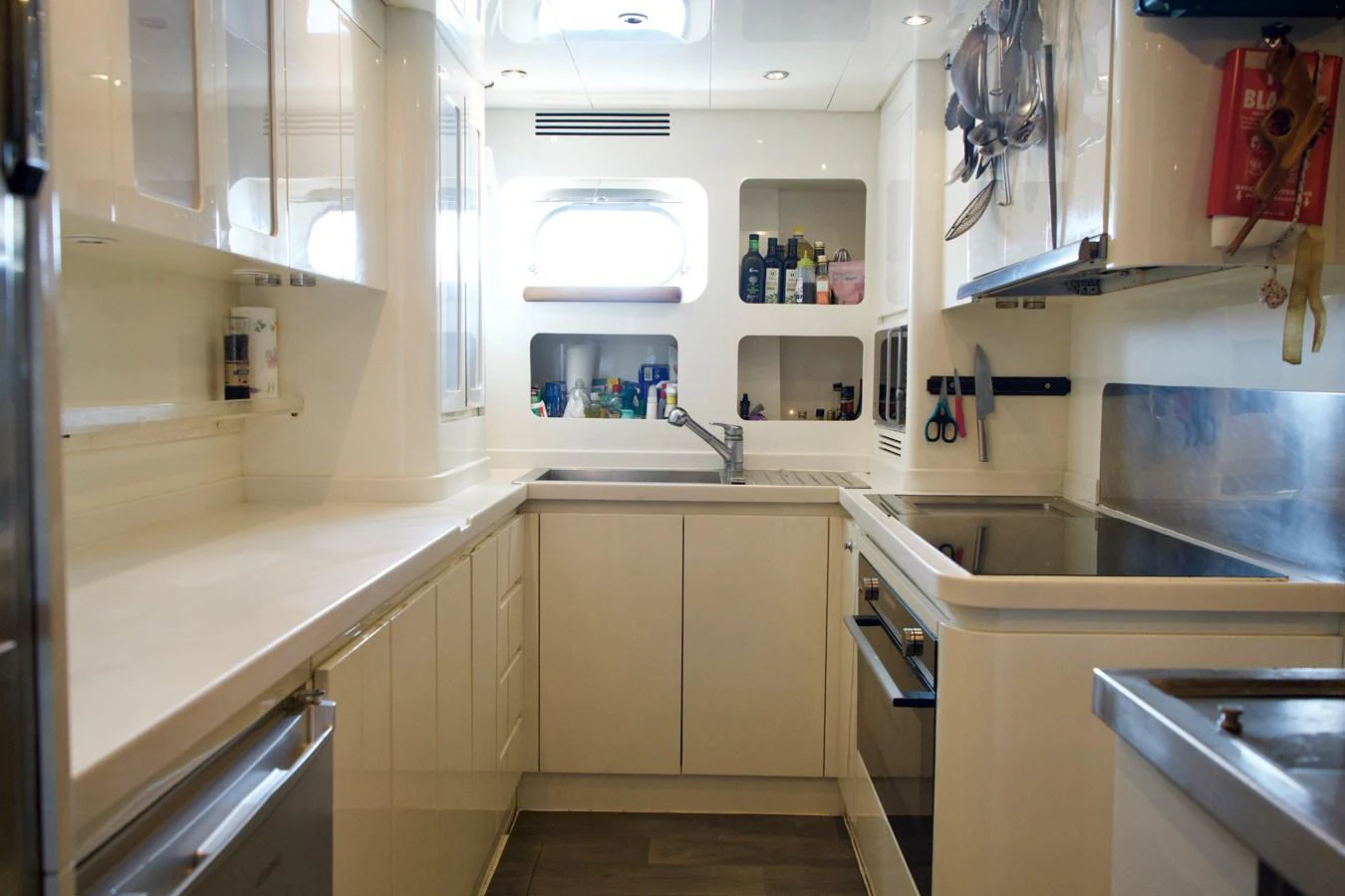 The yacht's galley is equipped with modern appliances and ample storage, offering a functional and stylish space for meal preparation. aboard CHEEKY TIGER Yacht for Sale