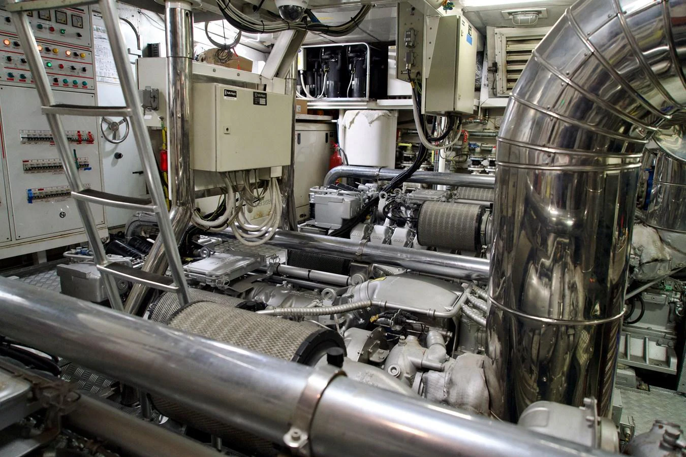 The image showcases the yacht's well-maintained engine room with advanced machinery and equipment. aboard CHEEKY TIGER Yacht for Sale