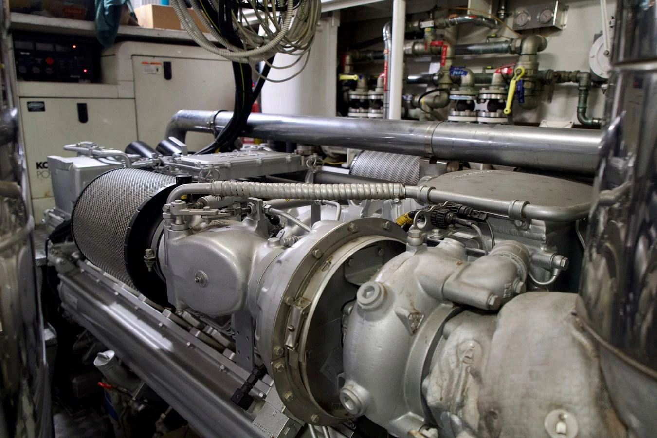 The image showcases the intricate details of the yacht's engine room, highlighting its mechanical components. aboard CHEEKY TIGER Yacht for Sale