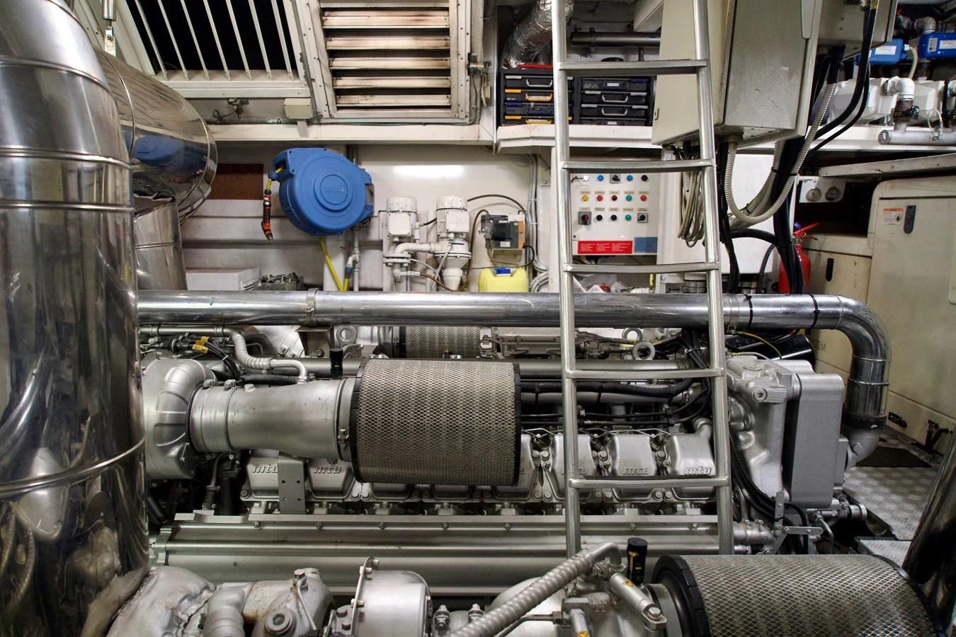 The image showcases the yacht's well-maintained engine room with advanced machinery and equipment. aboard CHEEKY TIGER Yacht for Sale
