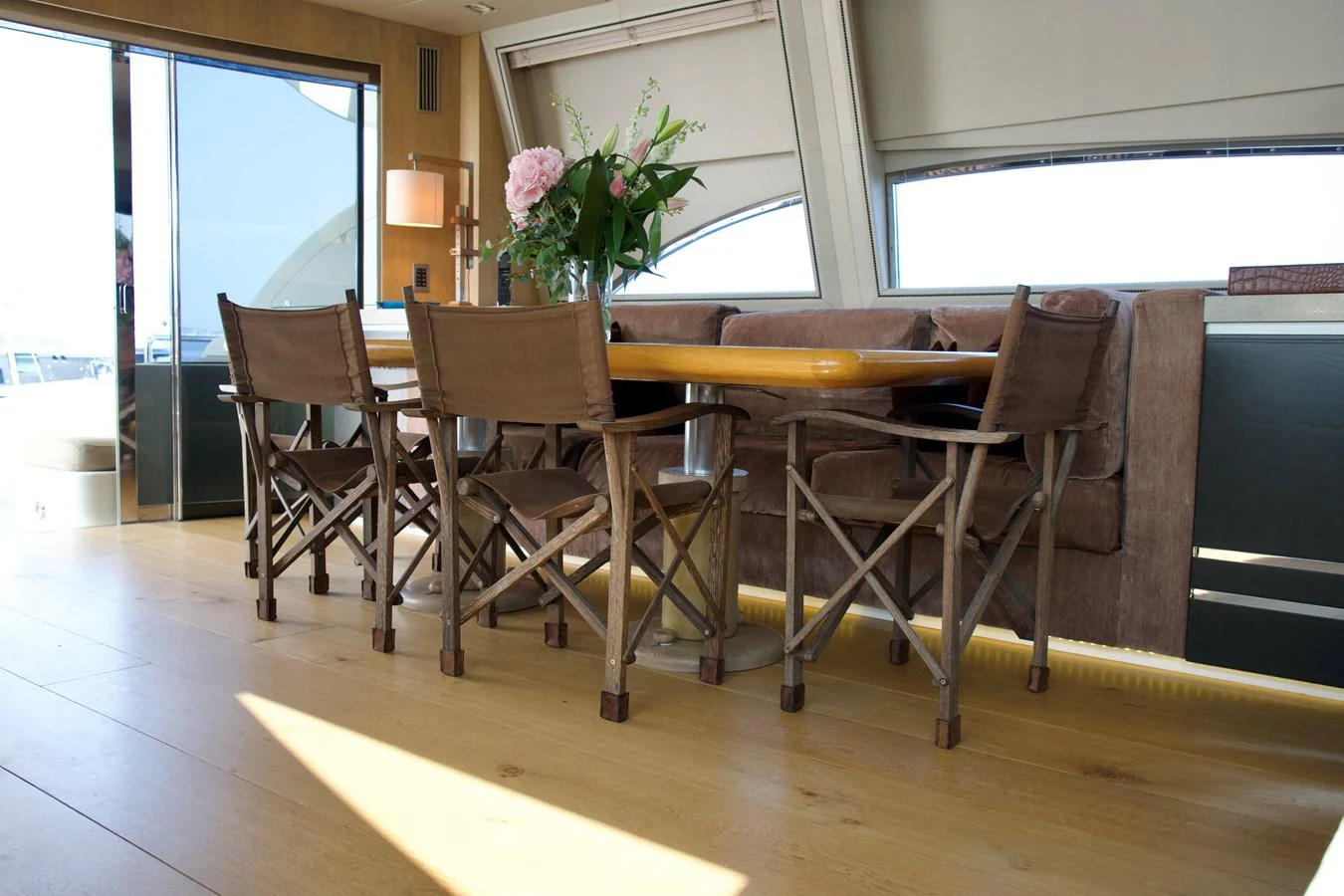 The yacht's dining area features a stylish table with comfortable seating and elegant decor. aboard CHEEKY TIGER Yacht for Sale