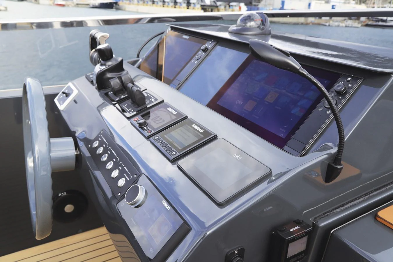 The helm station features advanced navigation and control systems with a sleek design. aboard MAVERICK Yacht for Sale