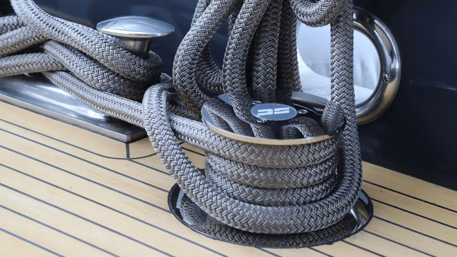 A close-up view of neatly coiled ropes on the yacht's deck, showcasing attention to detail and craftsmanship. aboard MAVERICK Yacht for Sale