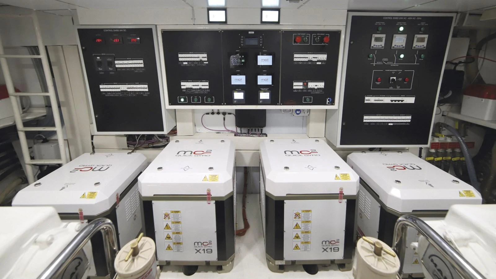 The image showcases the yacht's well-organized engine room with advanced control panels and machinery. aboard MAVERICK Yacht for Sale
