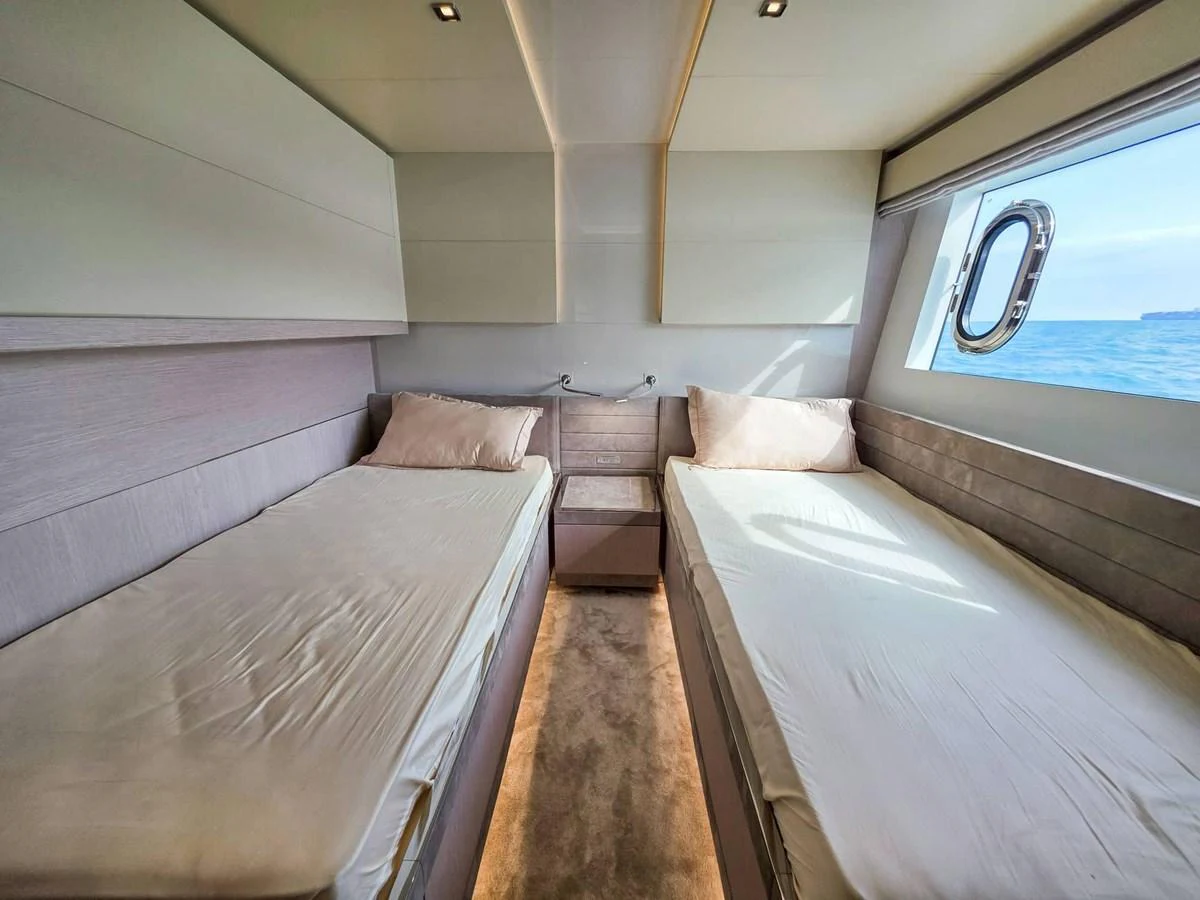 a room with two beds aboard CUSTOM LINE 108 Yacht for Sale
