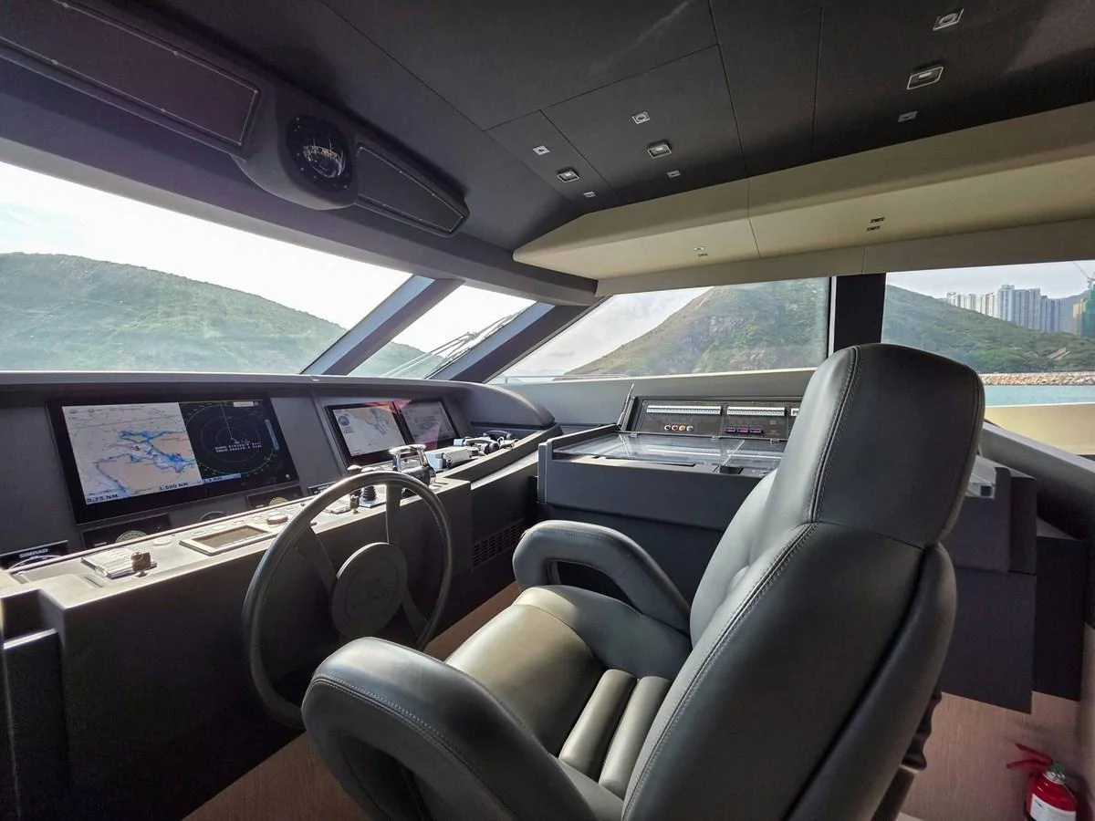 inside of a car aboard CUSTOM LINE 108 Yacht for Sale