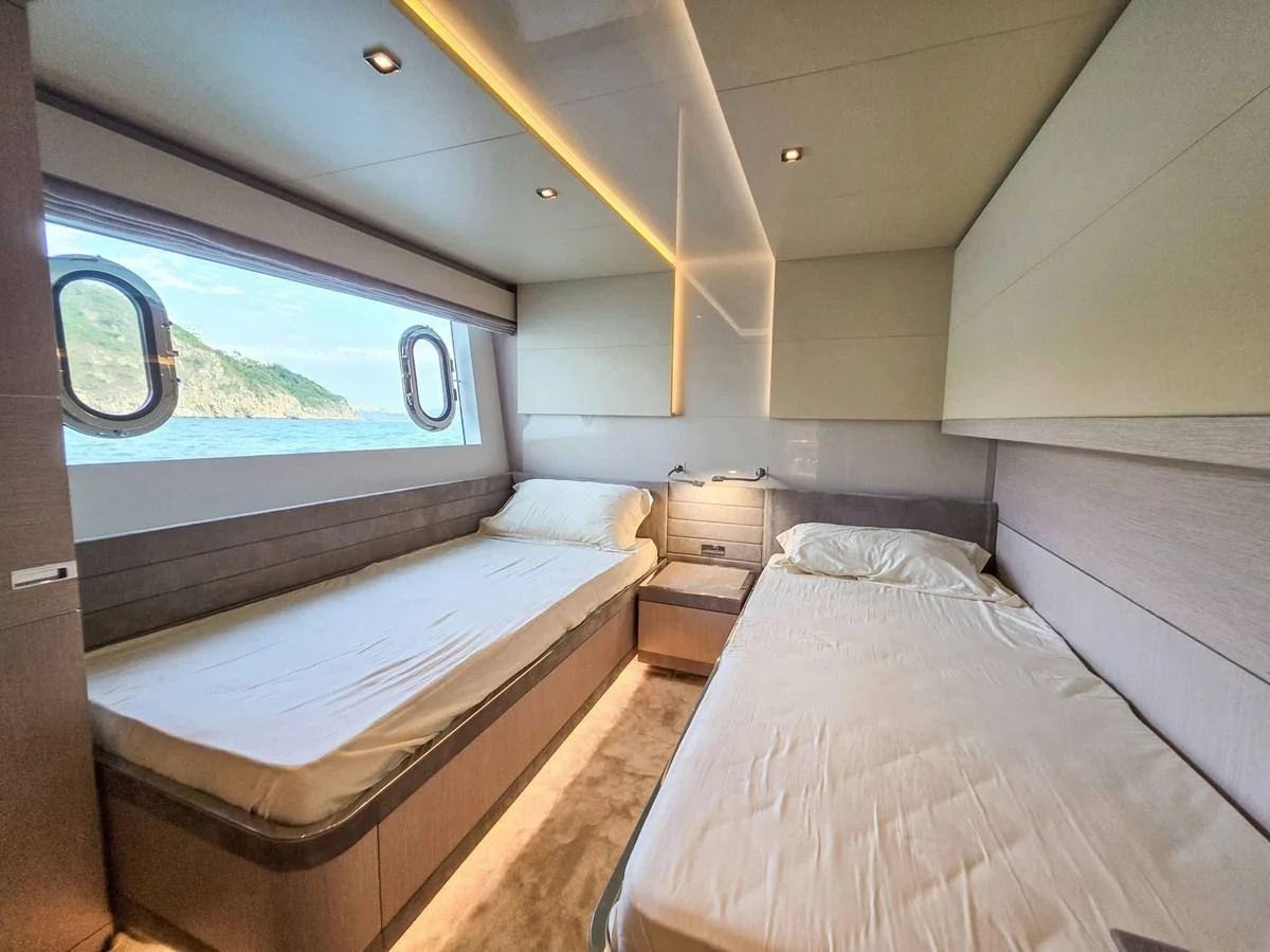 a room with two beds aboard CUSTOM LINE 108 Yacht for Sale