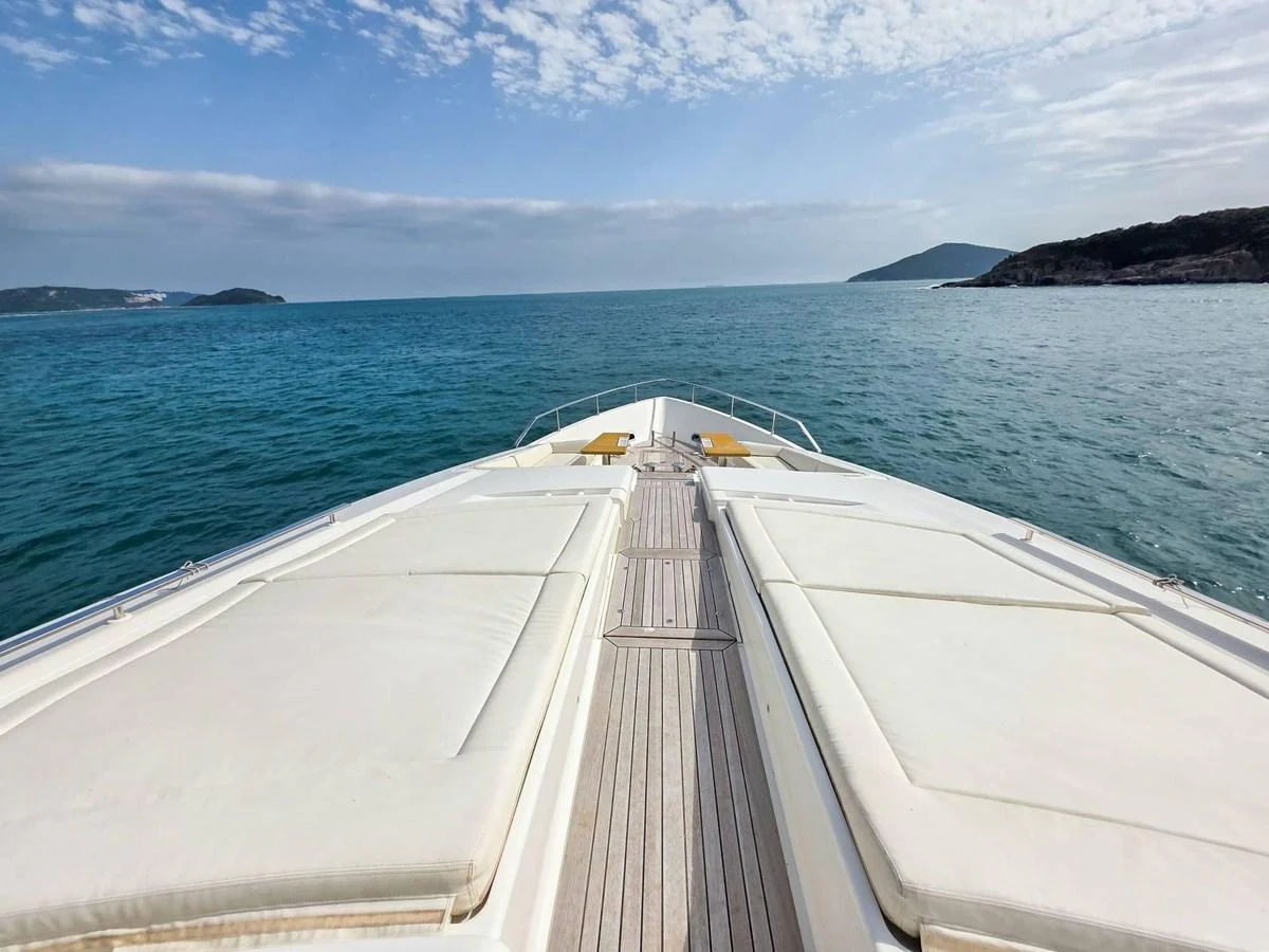 a boat on the water aboard CUSTOM LINE 108 Yacht for Sale