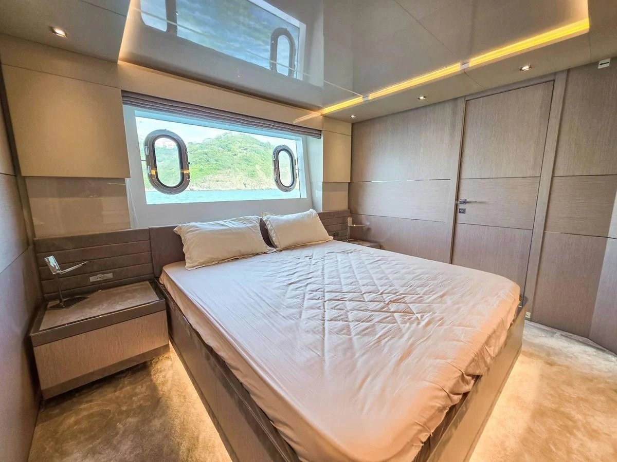 a bed in a room aboard CUSTOM LINE 108 Yacht for Sale