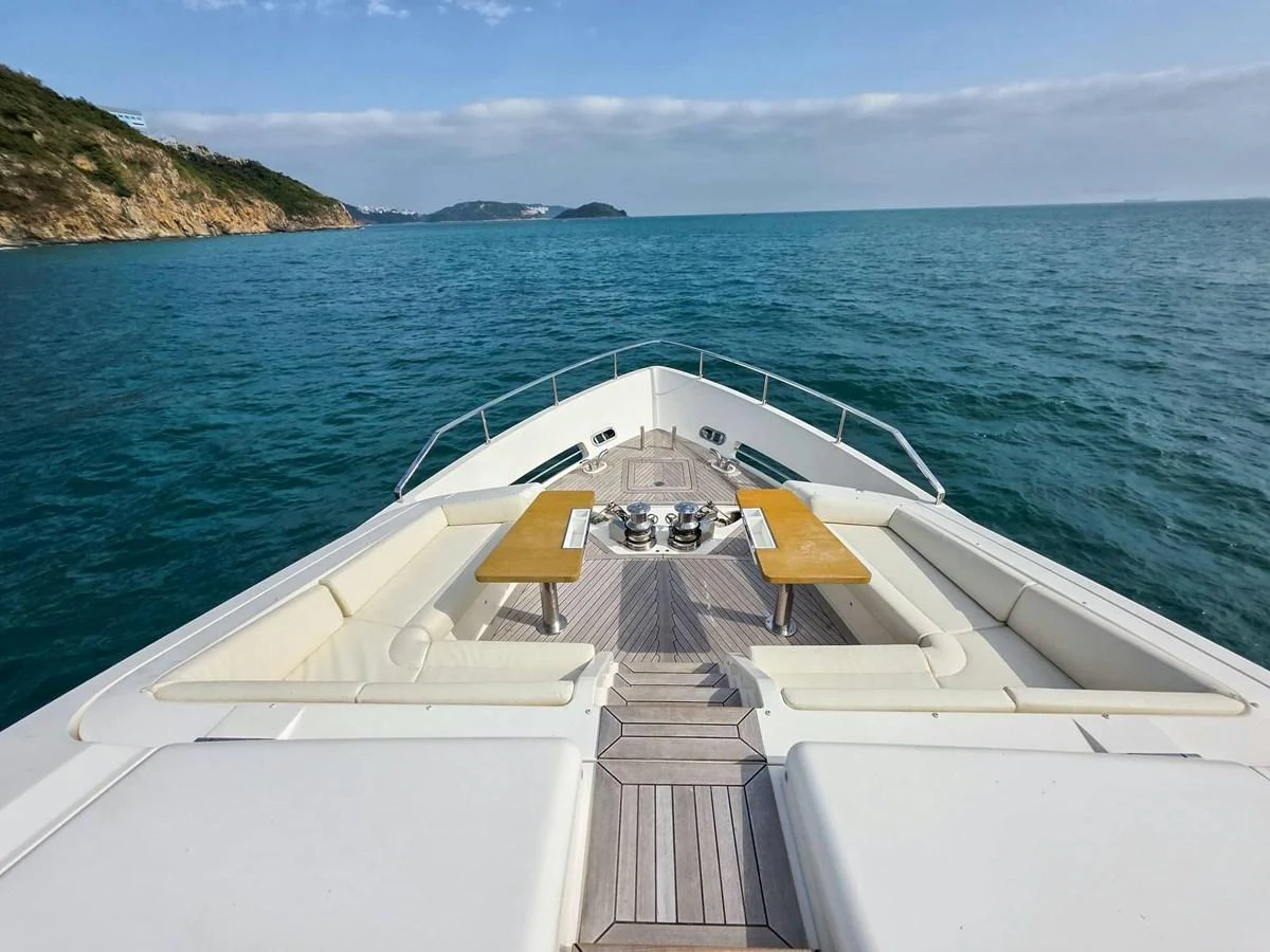 a boat on the water aboard CUSTOM LINE 108 Yacht for Sale