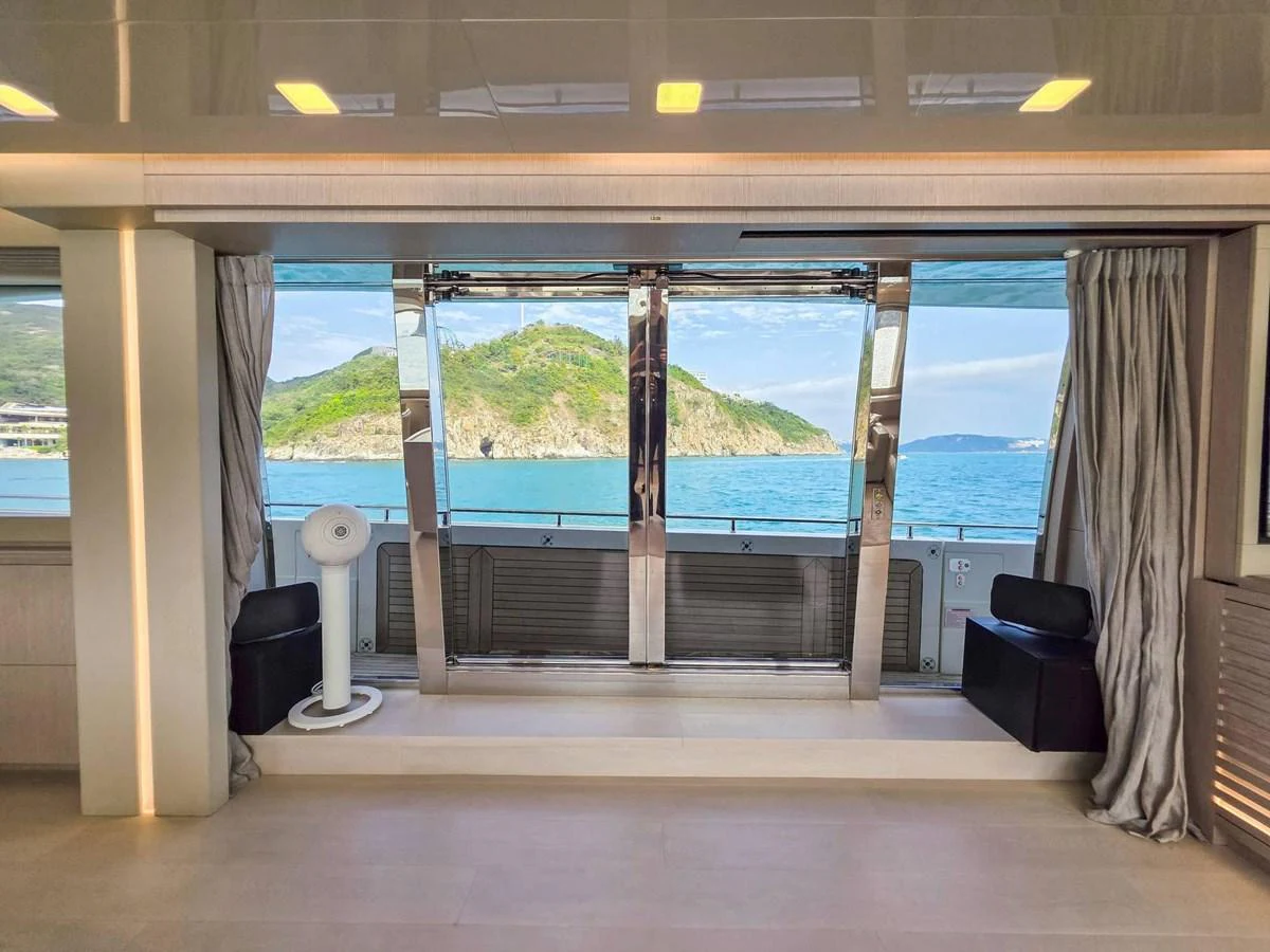 a room with a view of the ocean and the ocean aboard CUSTOM LINE 108 Yacht for Sale