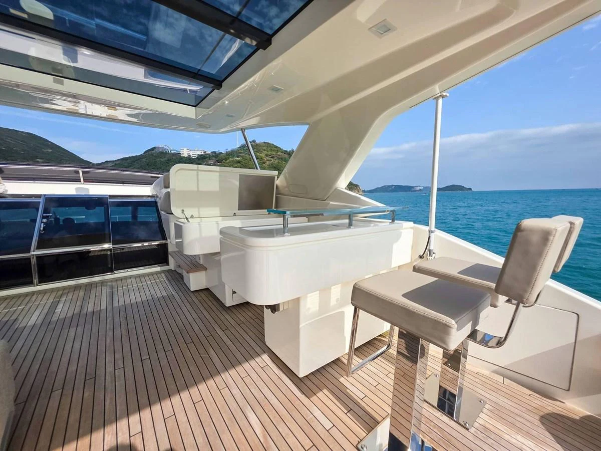 a boat on the water aboard CUSTOM LINE 108 Yacht for Sale
