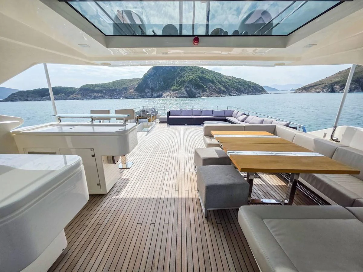 a boat dock with a mountain in the background aboard CUSTOM LINE 108 Yacht for Sale