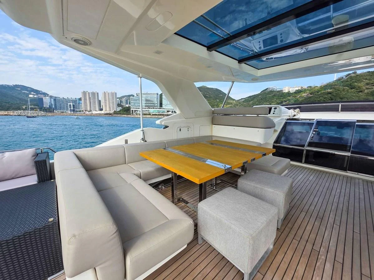 a boat on the water aboard CUSTOM LINE 108 Yacht for Sale