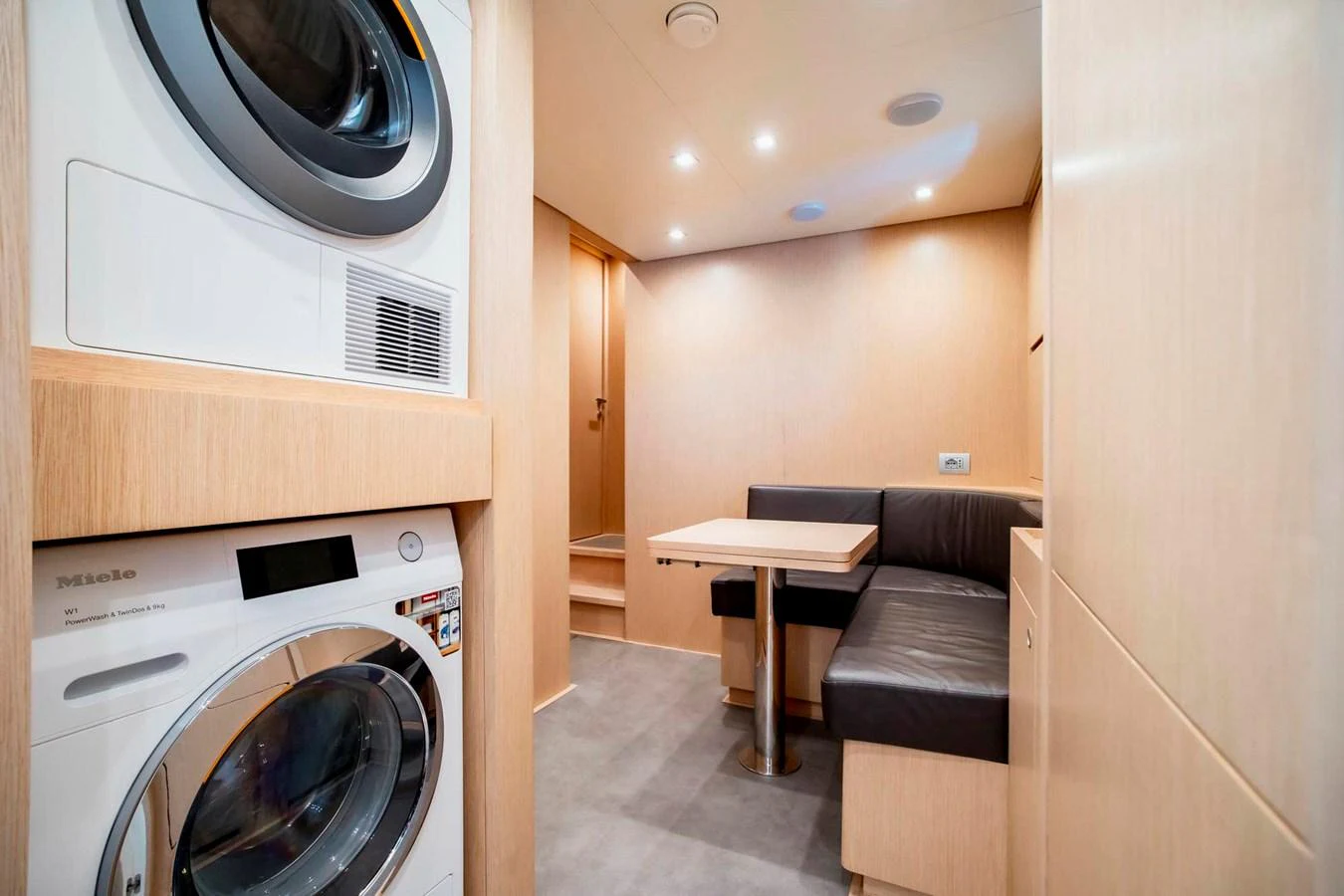 The crew area features a compact dining nook and laundry facilities, ensuring comfort and convenience for the staff. aboard SANLORENZO SX100 Yacht for Sale