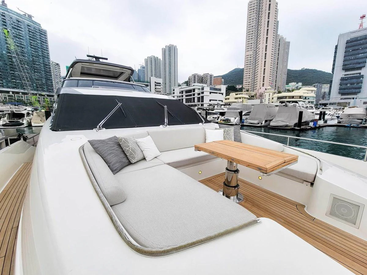 The foredeck features a spacious lounging area with a table, perfect for relaxation and socializing. aboard SANLORENZO SL86 Yacht for Sale