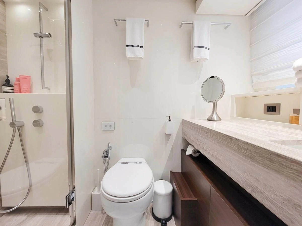 The yacht's bathroom features modern fixtures and a clean, minimalist design. aboard SANLORENZO SL86 Yacht for Sale