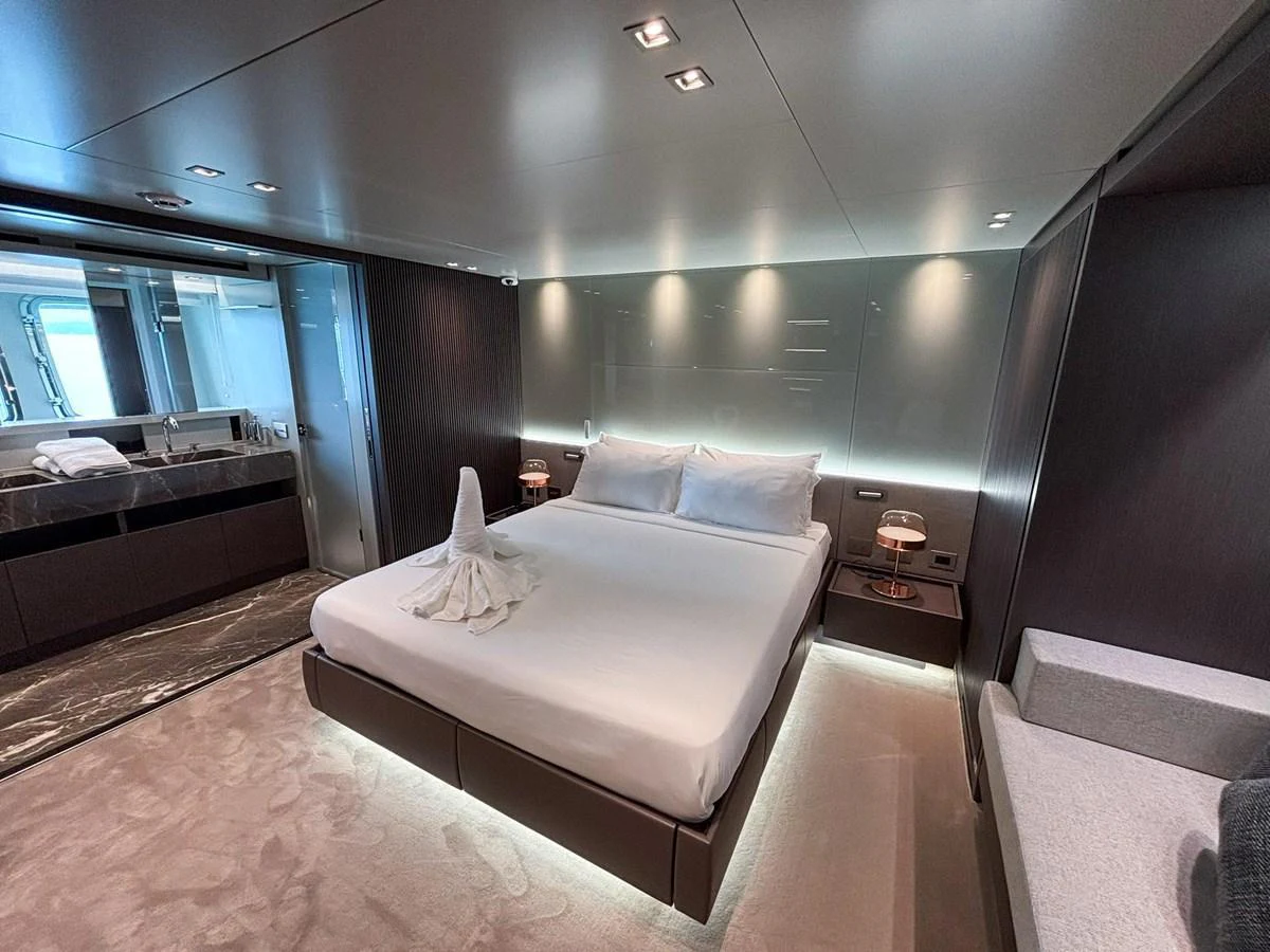 The master stateroom offers a luxurious and serene retreat with modern furnishings and ambient lighting. aboard SANLORENZO SX88 Yacht for Sale